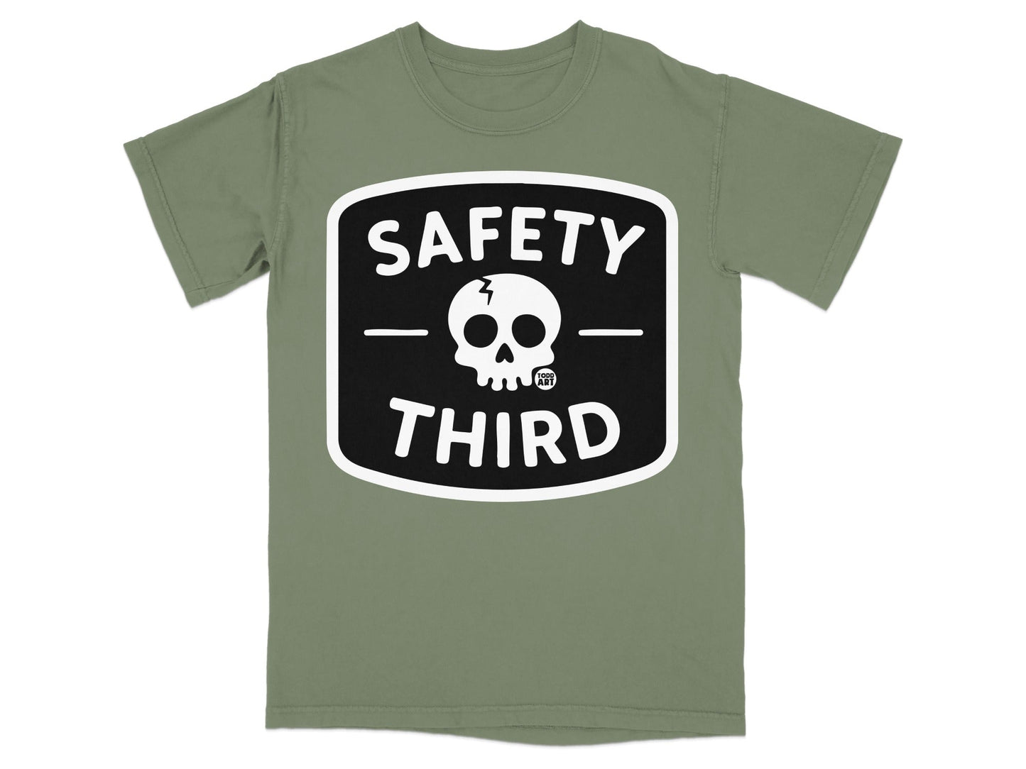 Green t-shirt with a black and white "Safety Third" skull logo.