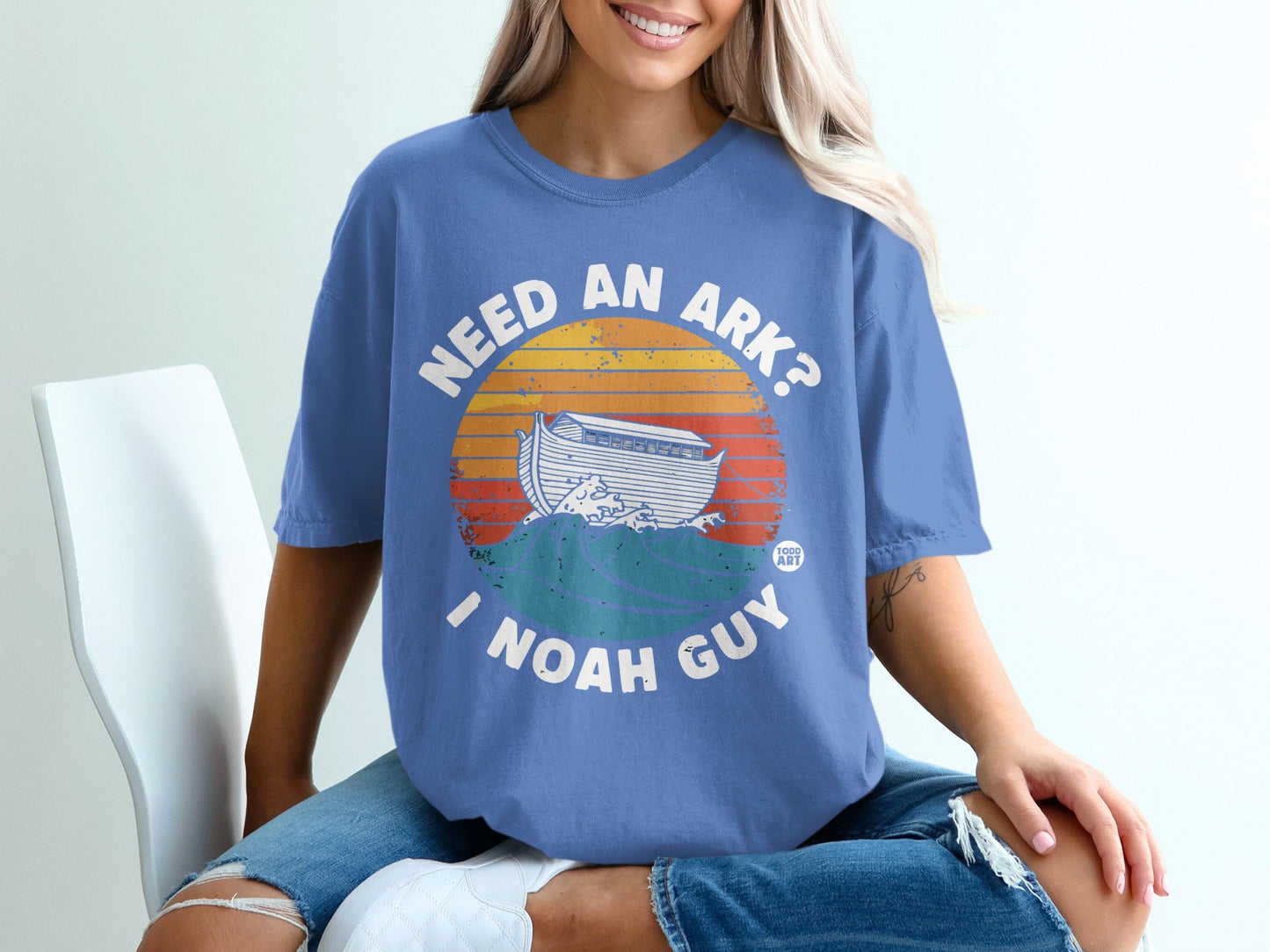 T-shirt with "Need an Ark? I Noah Guy" text and Noah's Ark graphic.