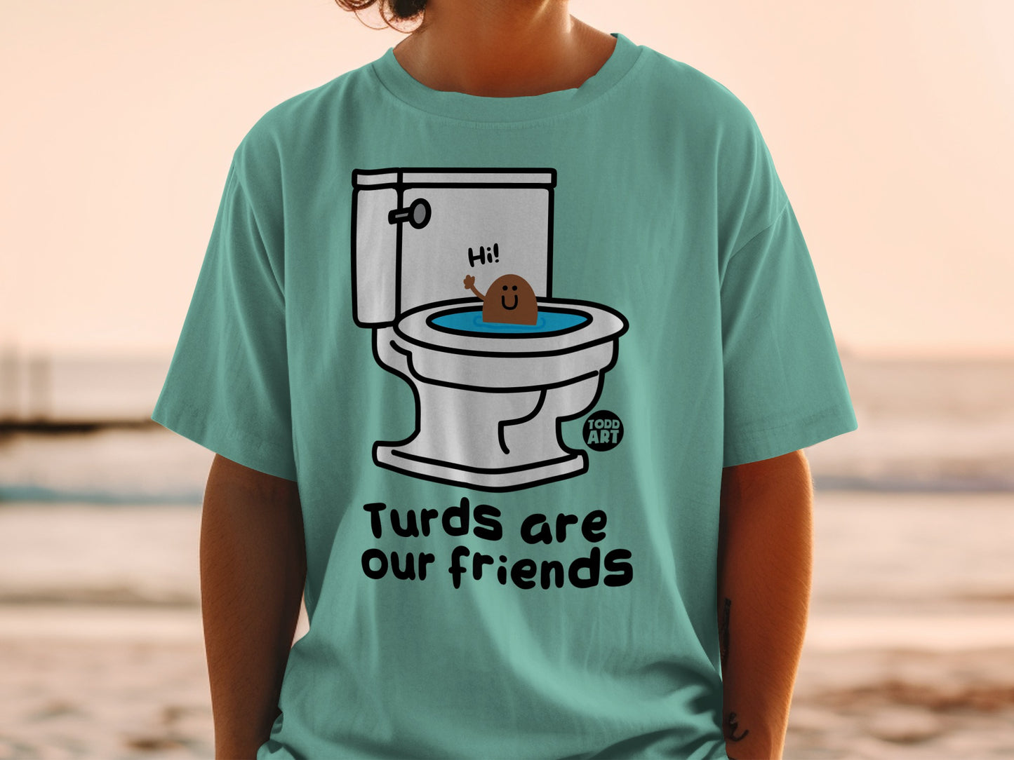 Cartoon toilet with smiling poop character, text "Turds are our friends".