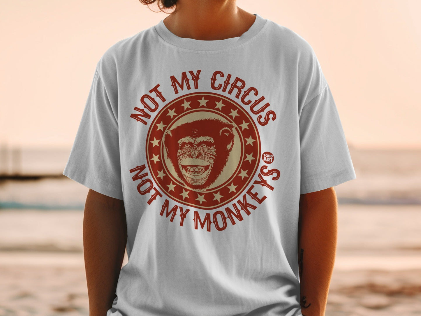 White t-shirt with distressed monkey graphic and "Not My Circus Not My Monkeys" text.