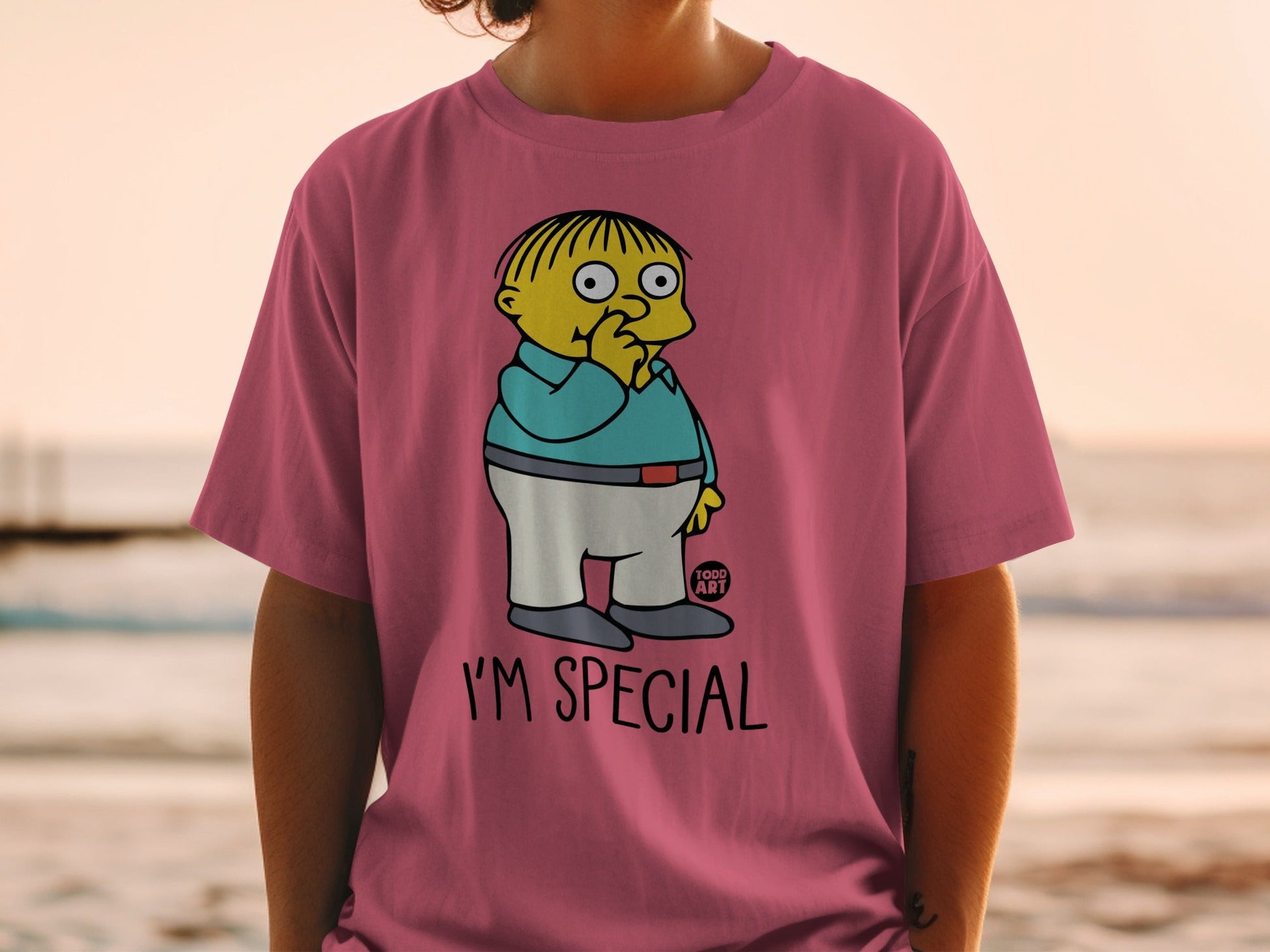 Ralph Wiggum from The Simpsons on a pink t-shirt, "I'M SPECIAL" text.