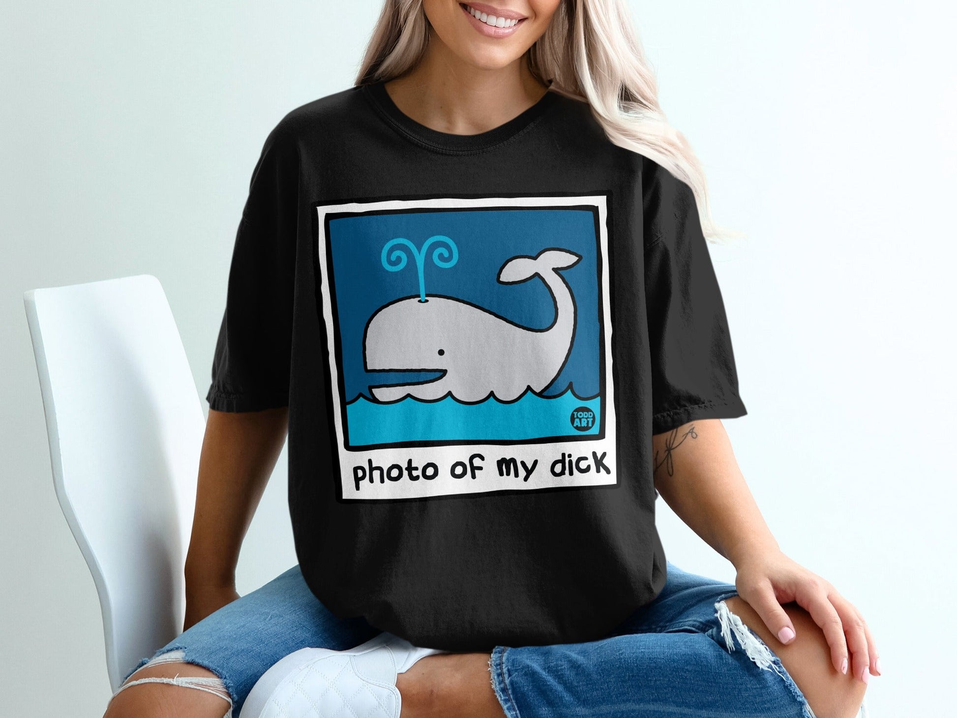 Black t-shirt with whale graphic and "photo of my dick" text.