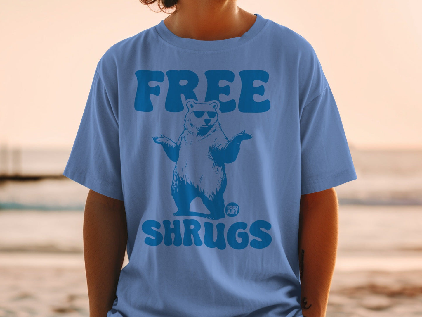 Free Shrugs Bear Graphic T-Shirt by Todd Art