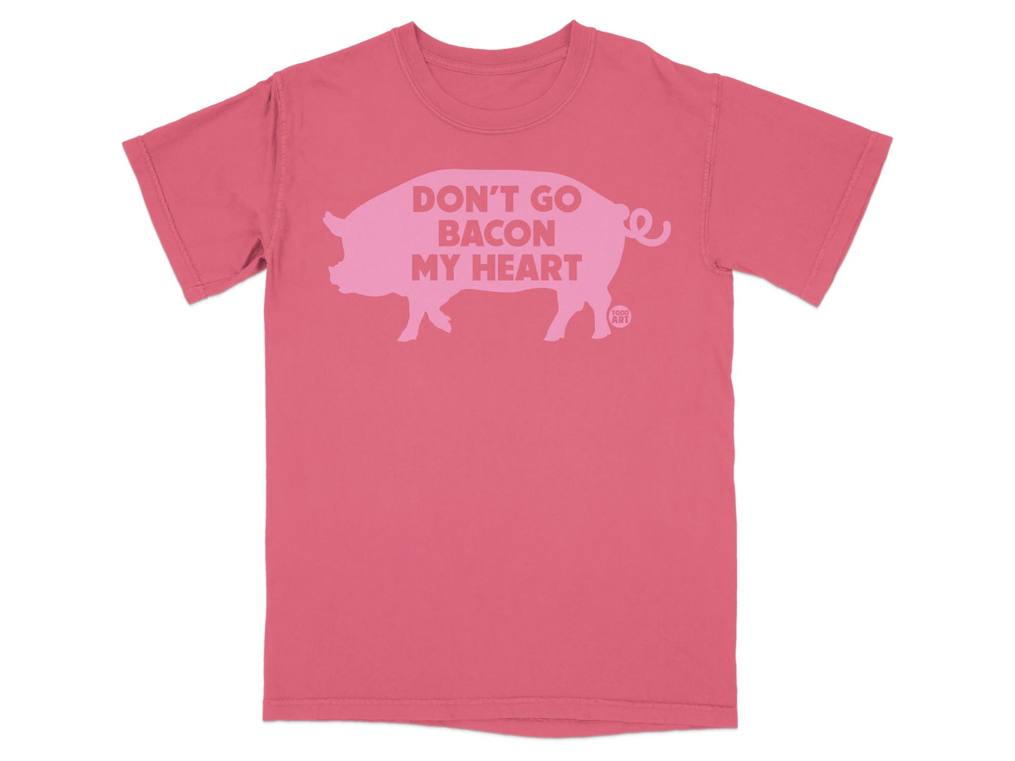 Pink t-shirt with silhouette of a pig and text "DON'T GO MY HEART".