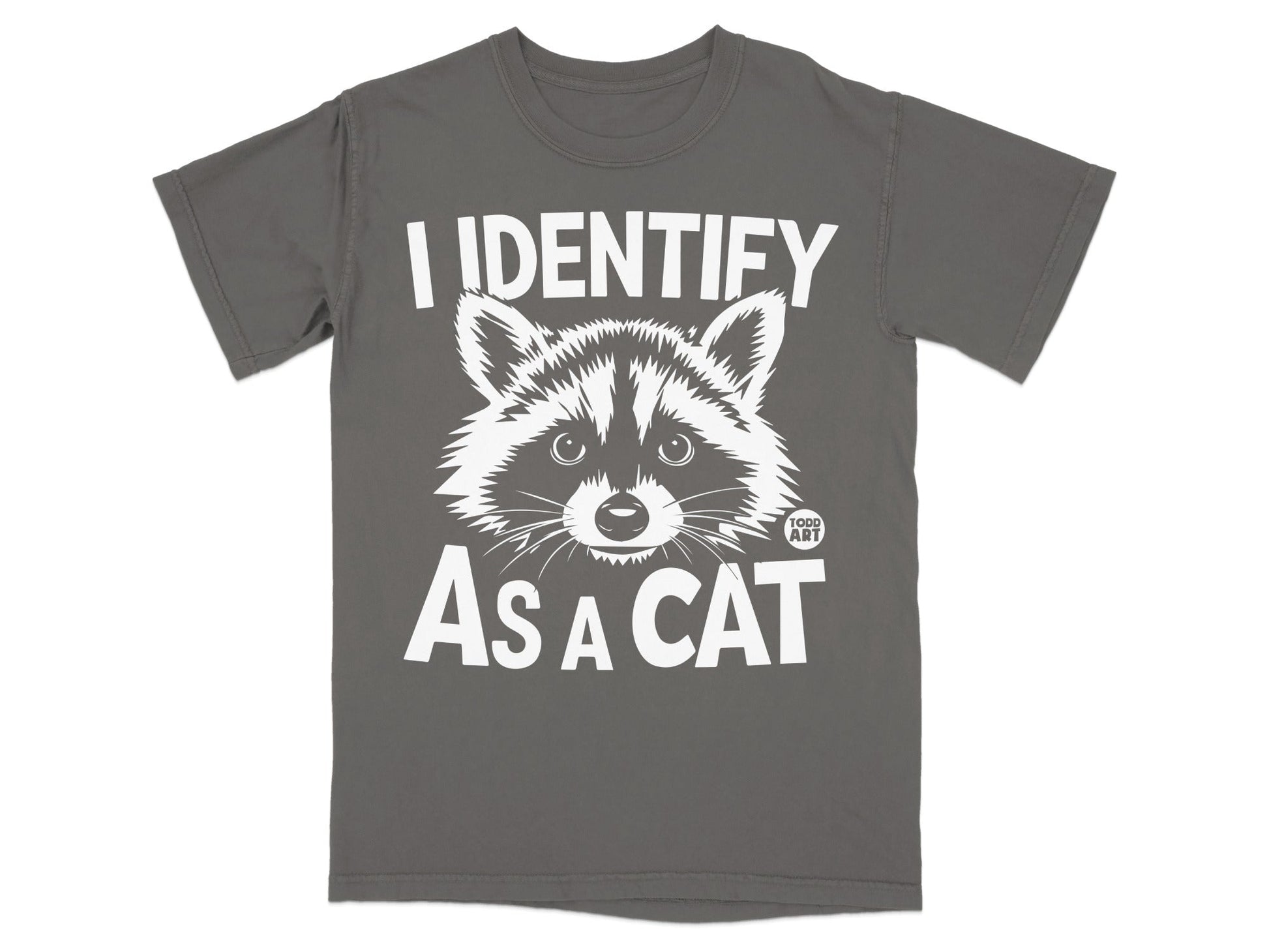 Dark grey t-shirt with white text and raccoon graphic that says "I IDENTIFY AS A CAT".