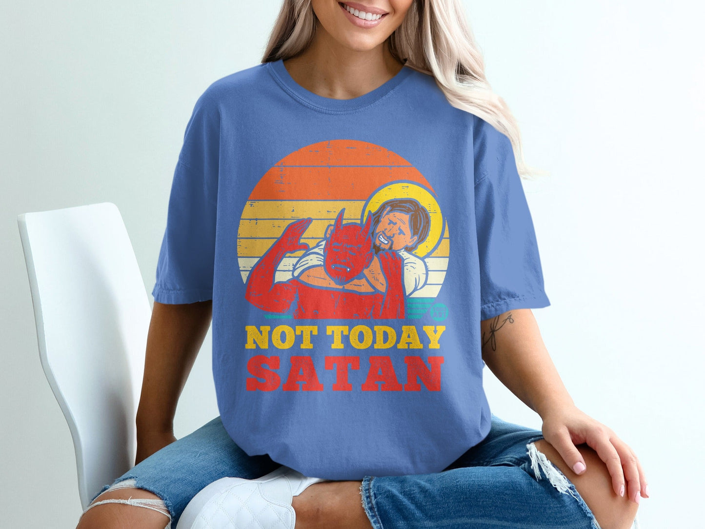 Devil and angel graphic on a blue t-shirt with "Not Today Satan" text.