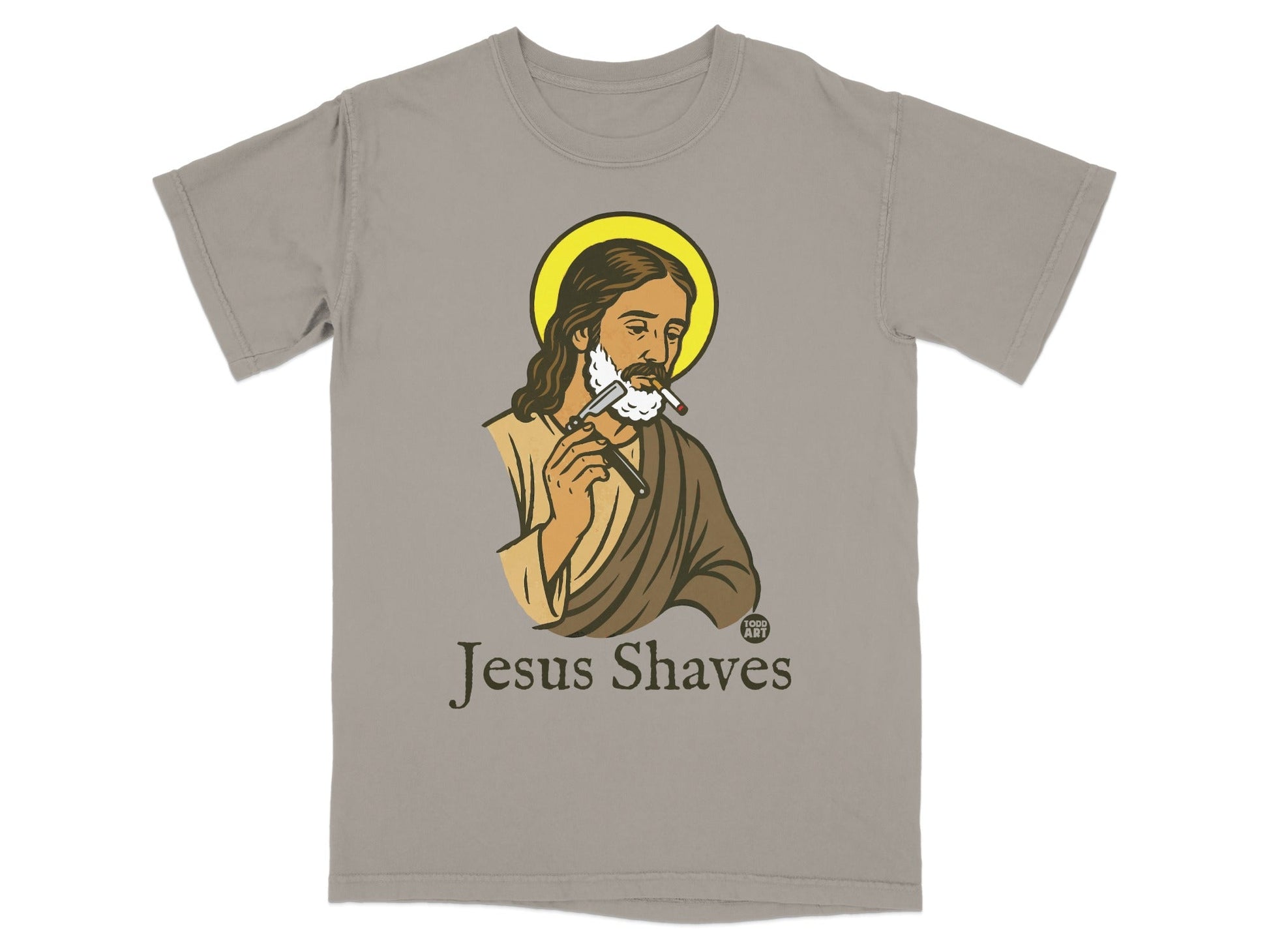 Jesus Shaves t-shirt featuring illustration of Jesus with halo shaving his beard.
