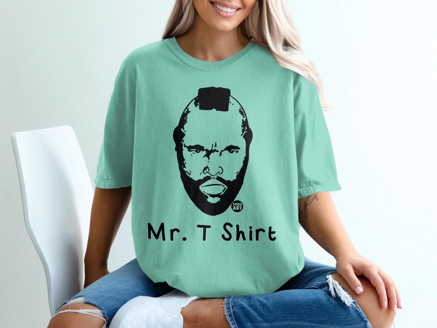 Mint green t-shirt with Mr. T graphic and text "Mr. T Shirt".