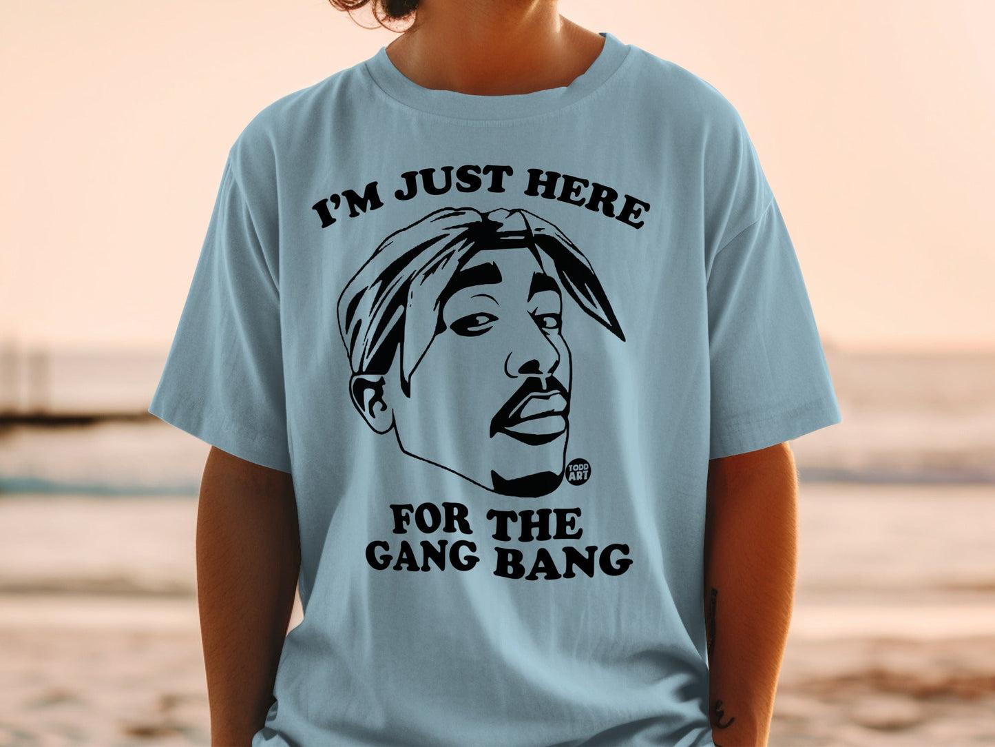 T-shirt with Tupac Shakur graphic and text "I'M JUST HERE FOR THE GANG BANG".