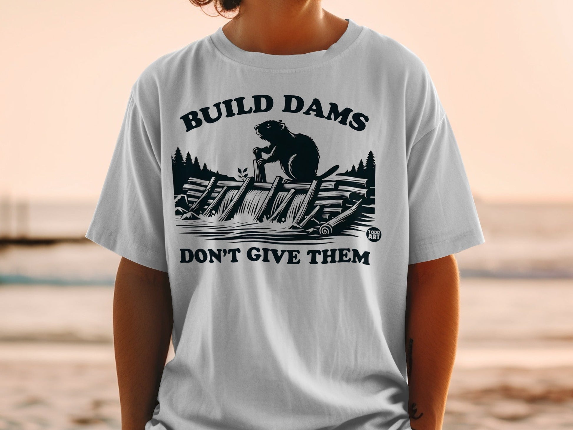 Build Dams Don't Give Them Graphic T-Shirt