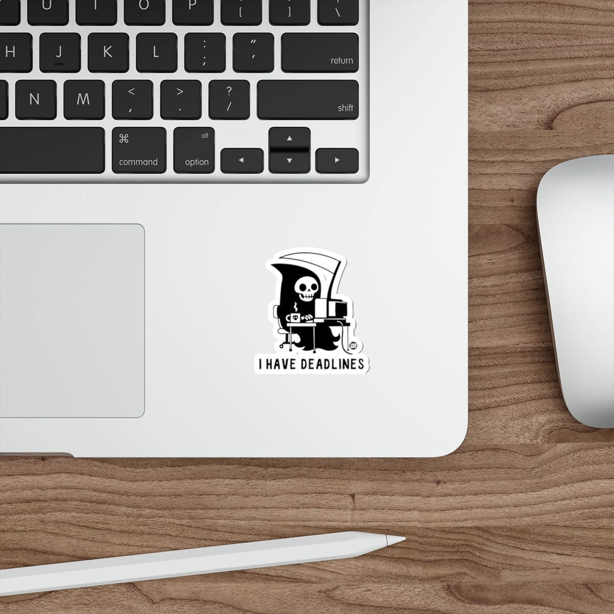 Grim reaper at a desk with a laptop and coffee cup, "I HAVE DEADLINES" text.