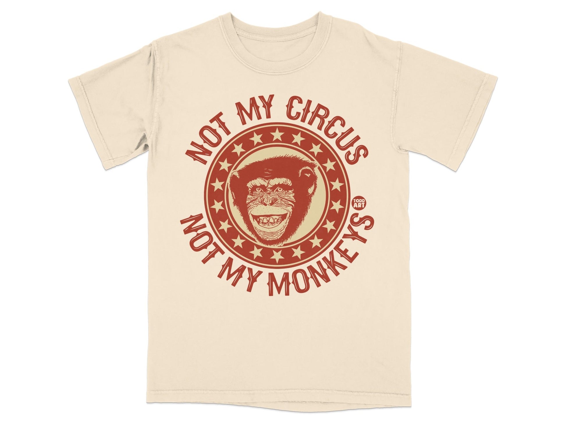 Cream t-shirt with "Not My Circus, Not My Monkeys" text and monkey illustration.