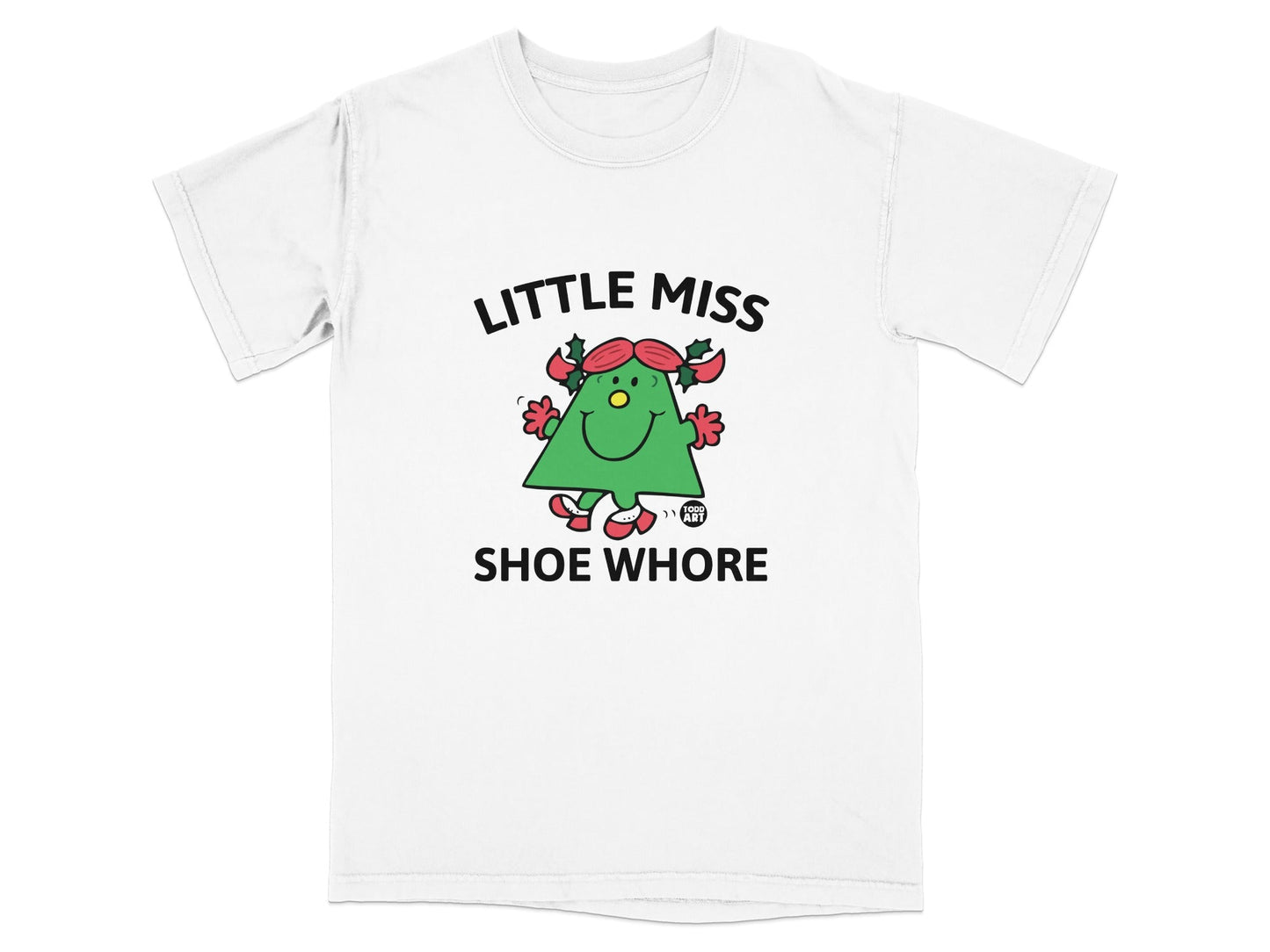 White t-shirt with "Little Miss Shoe Whore" text and a cartoon Christmas tree character.
