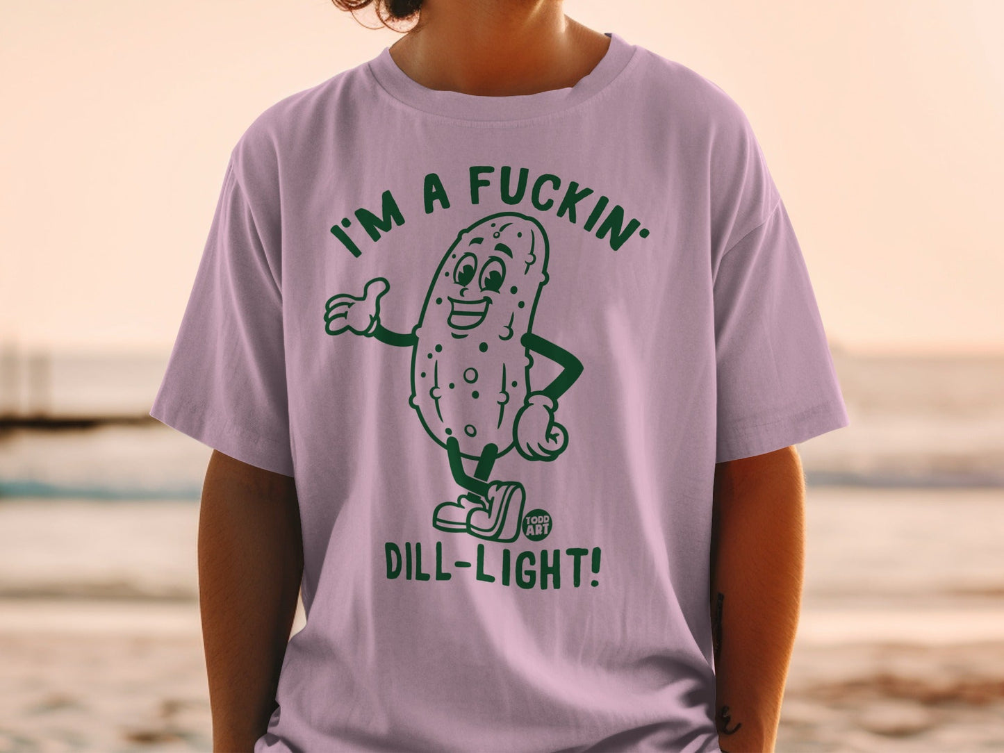 T-shirt with cartoon pickle saying "I'm a fuckin' dill-light!"