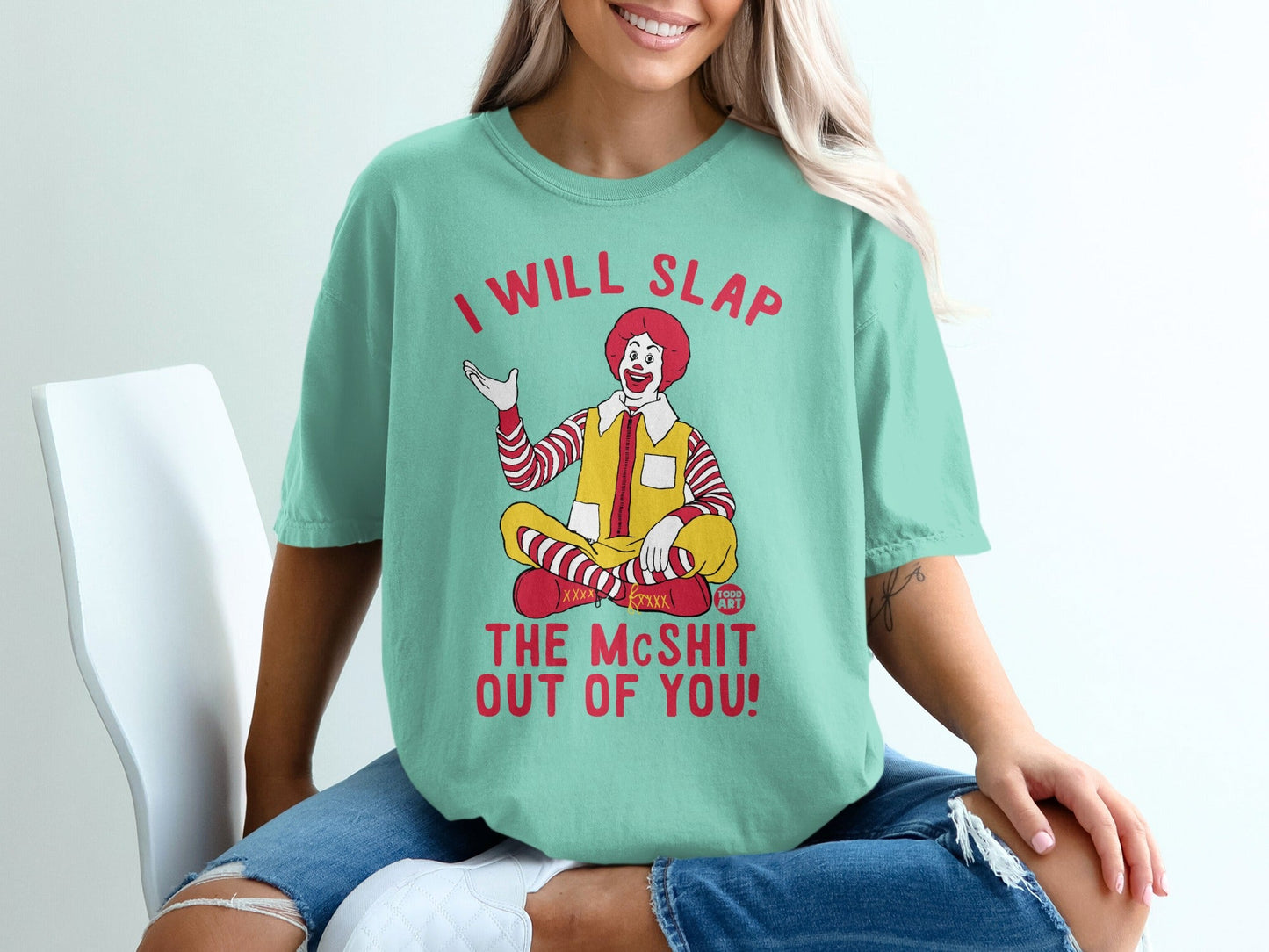 Teal t-shirt with Ronald McDonald graphic and "I WILL SLAP THE McSHIT OUT OF YOU!" text.