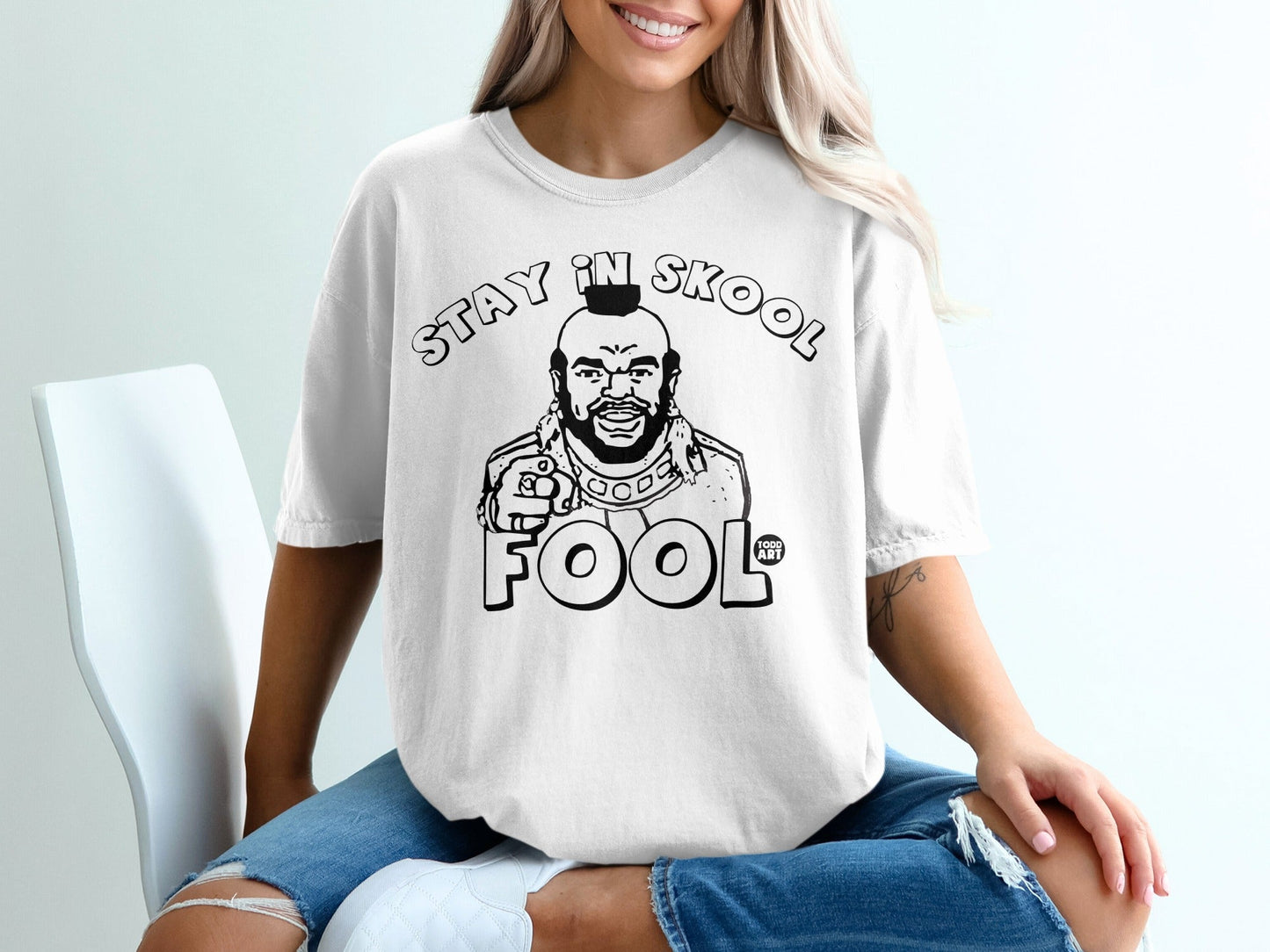 White t-shirt with "Stay Skool Fool" and Mr. T illustration.