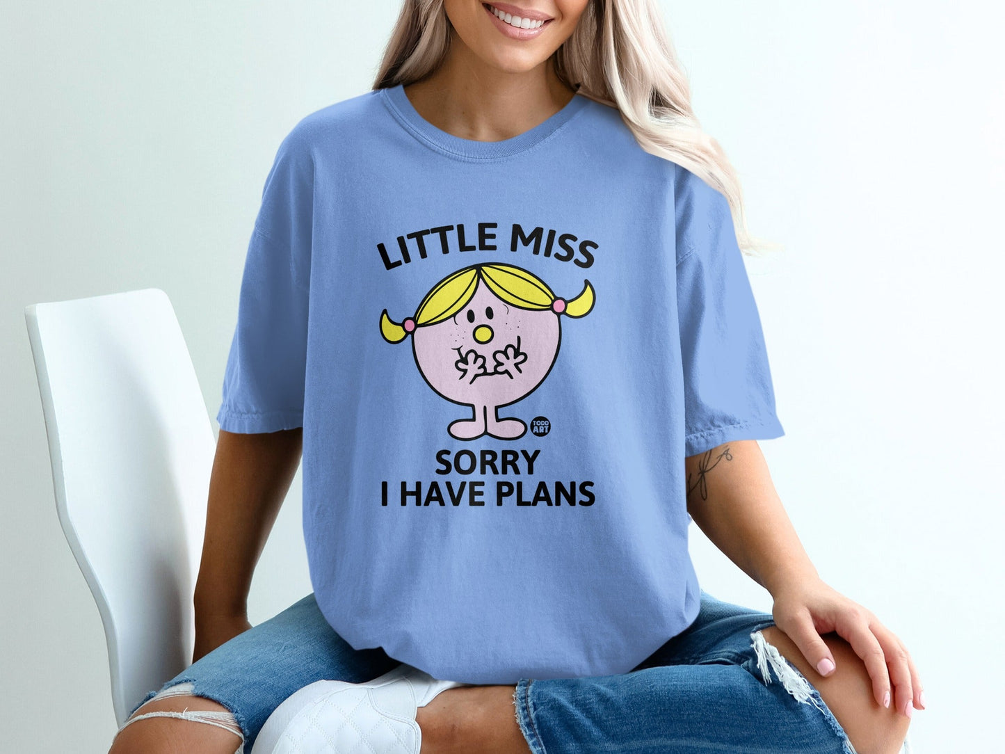 Light blue t-shirt with "Little Miss Sorry I Have Plans" graphic.