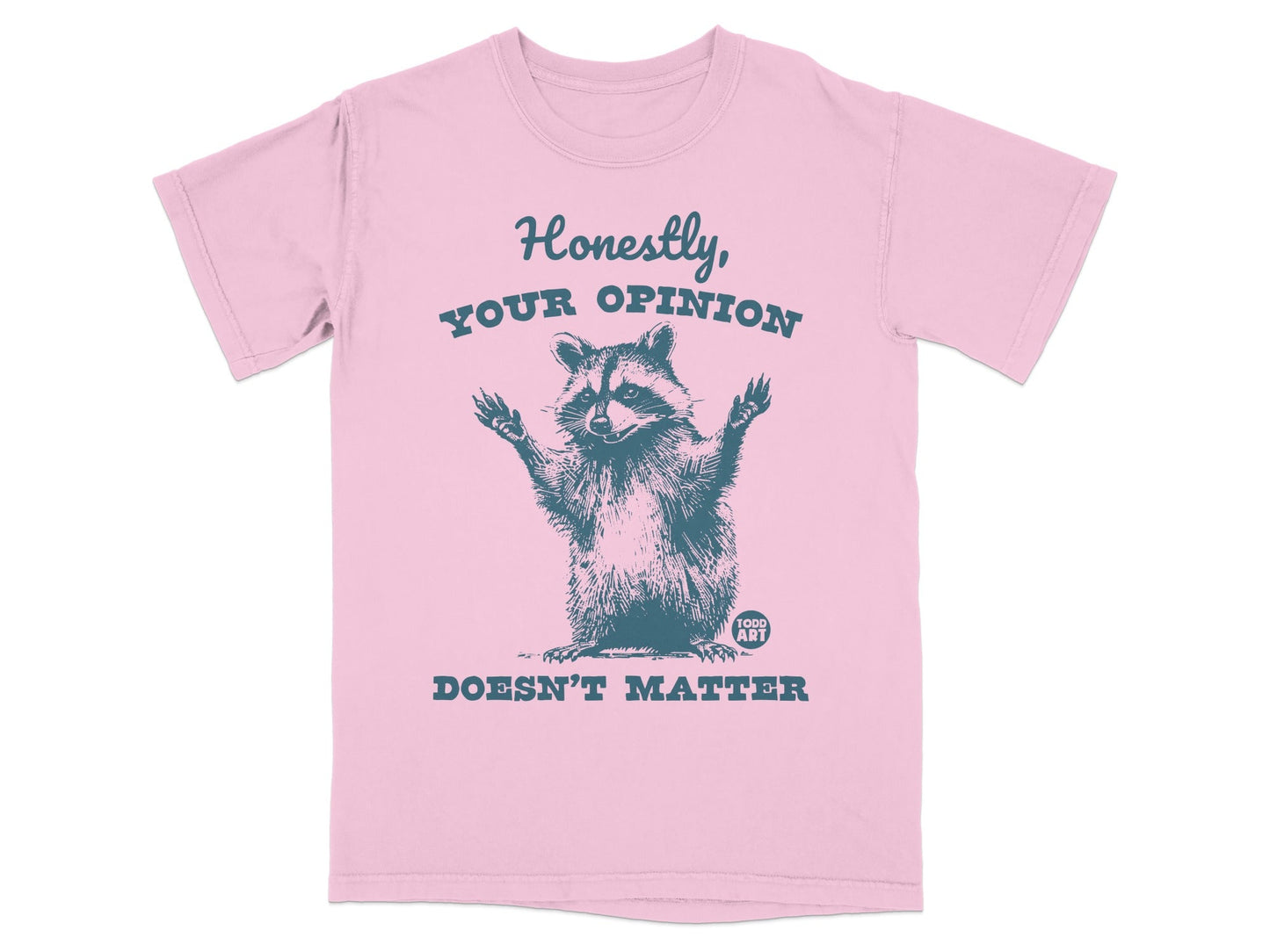 Pink t-shirt with raccoon graphic and text "Honestly, YOUR OPINION DOESN'T MATTER".