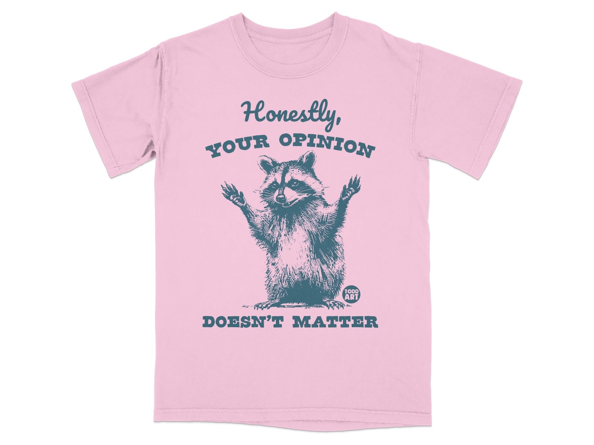 Pink t-shirt with raccoon graphic and text "Honestly, YOUR OPINION DOESN'T MATTER".