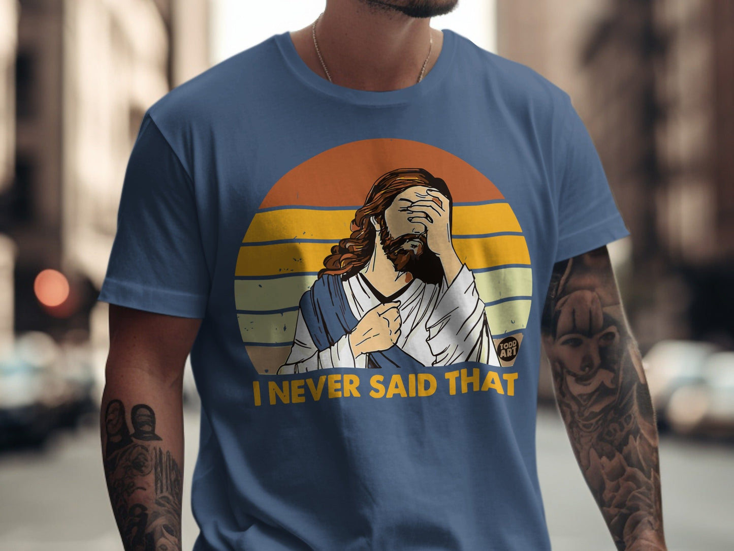 Jesus with hand over face, wearing blue robe, sunset background, text "I NEVER SAID THAT".