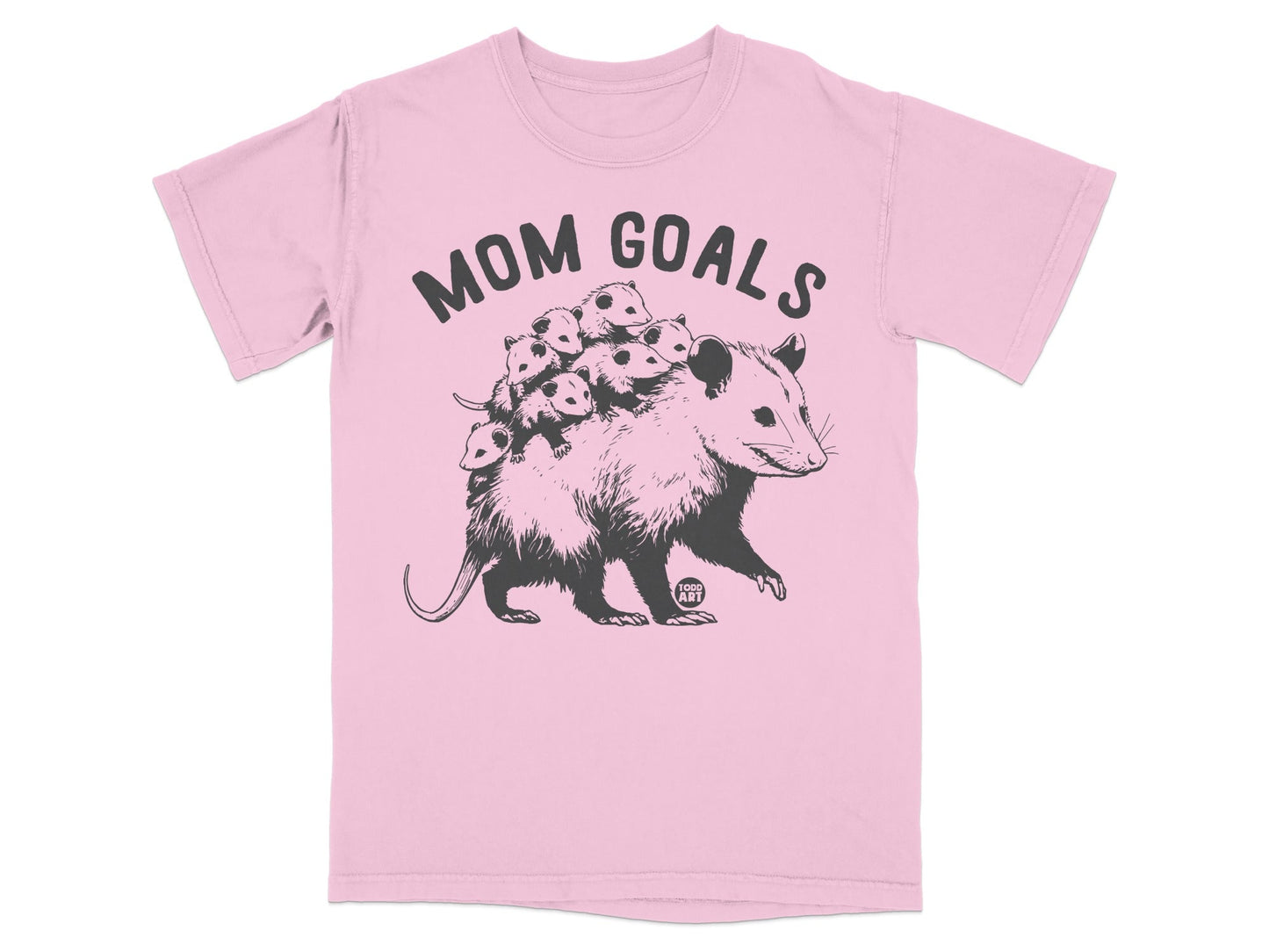 Opossum family with "MOM GOALS" text on pink t-shirt.