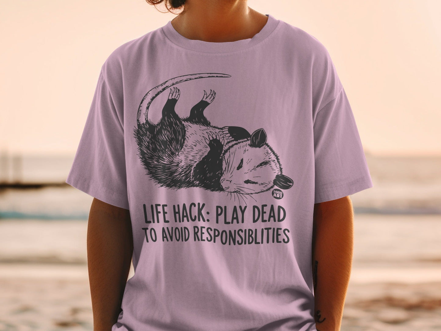 Opossum lying on back with text "LIFE HACK: PLAY DEAD TO AVOID RESPONSIBILITIES".