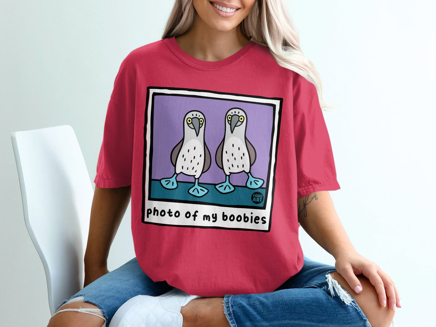 T-shirt featuring cartoon boobies with text "photo of my boobies".