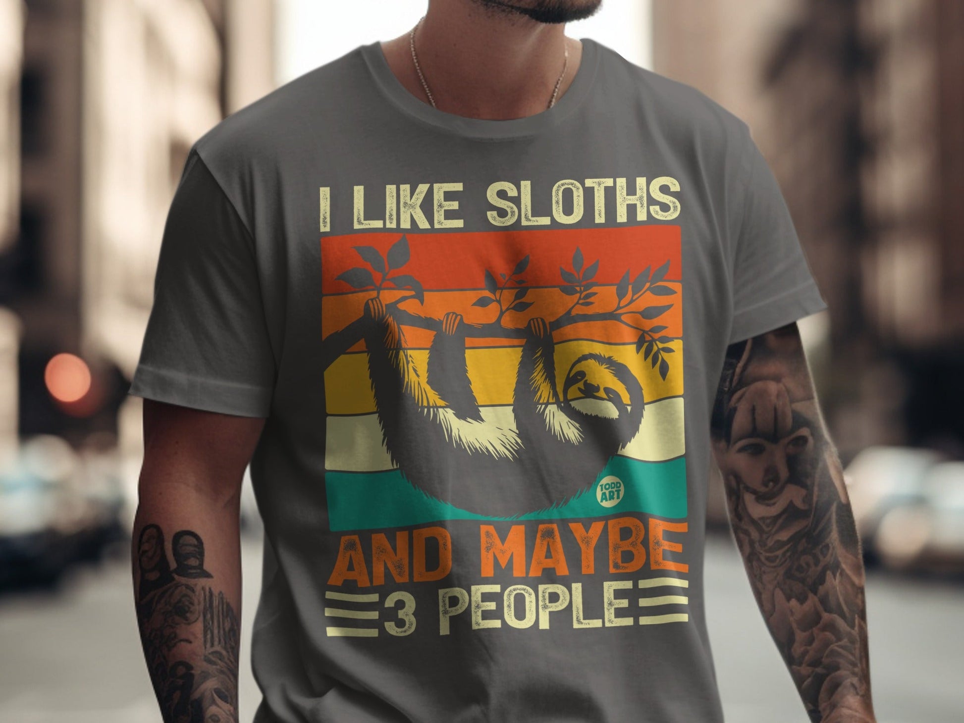 Gray t-shirt with "I Like Sloths And Maybe 3 People" text and sloth graphic.