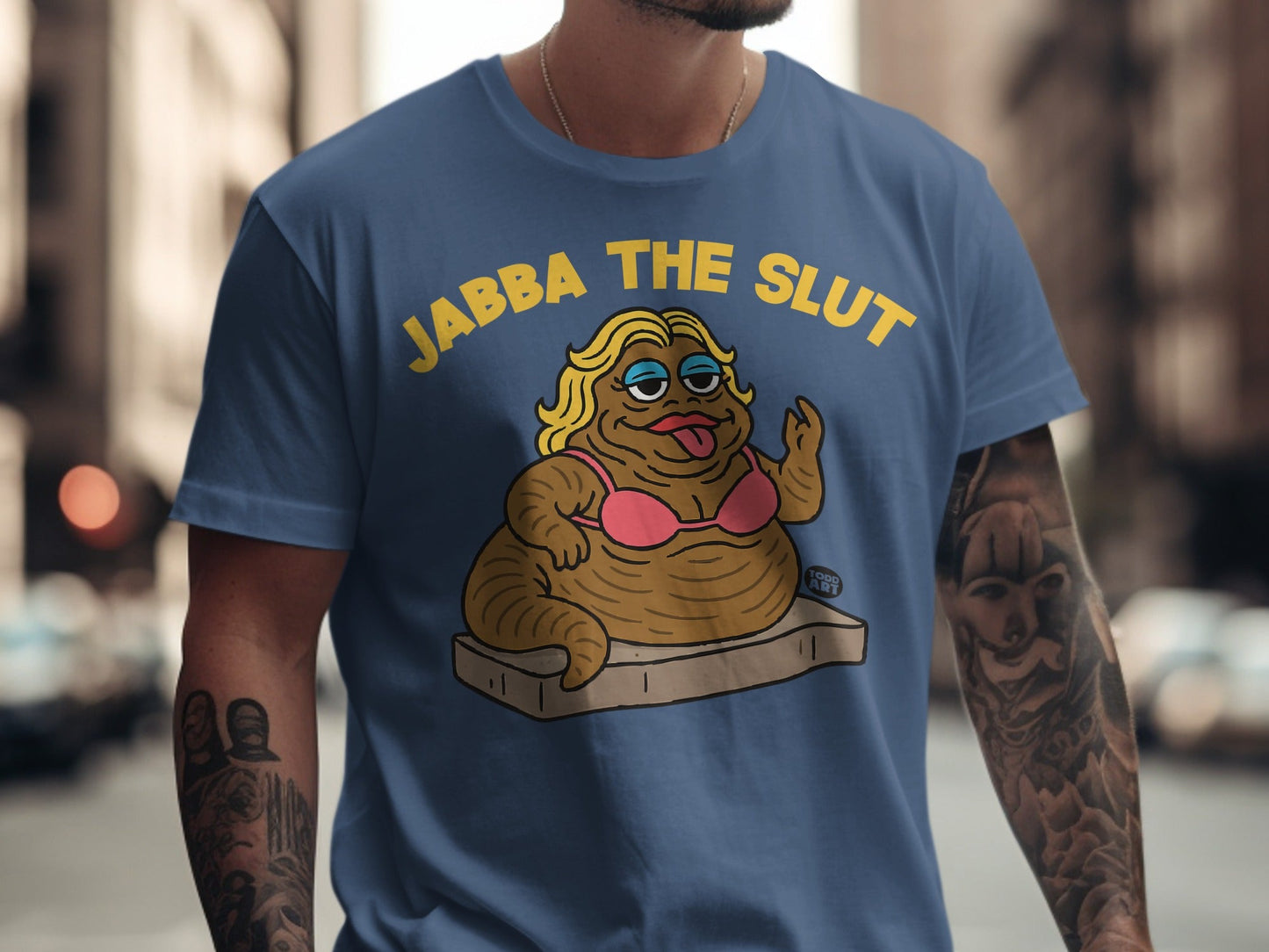 Cartoon of Jabba the Hutt wearing a pink bra and text "JABBA THE SLUT".