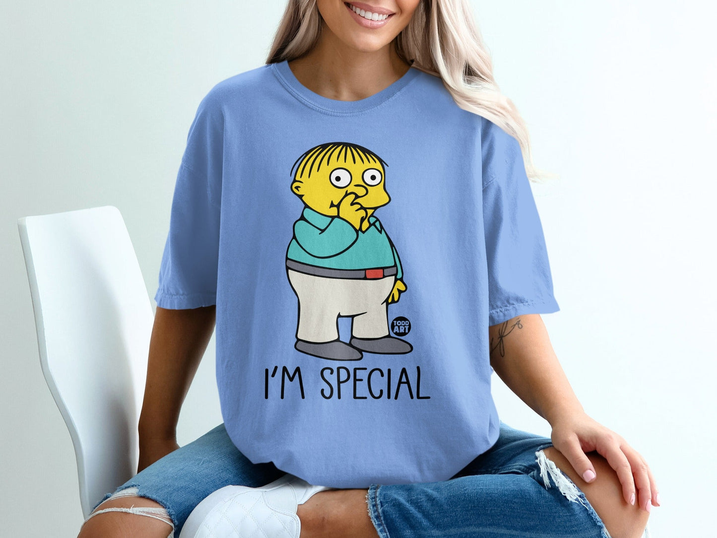 Blue t-shirt with Ralph Wiggum saying "I'm Special".