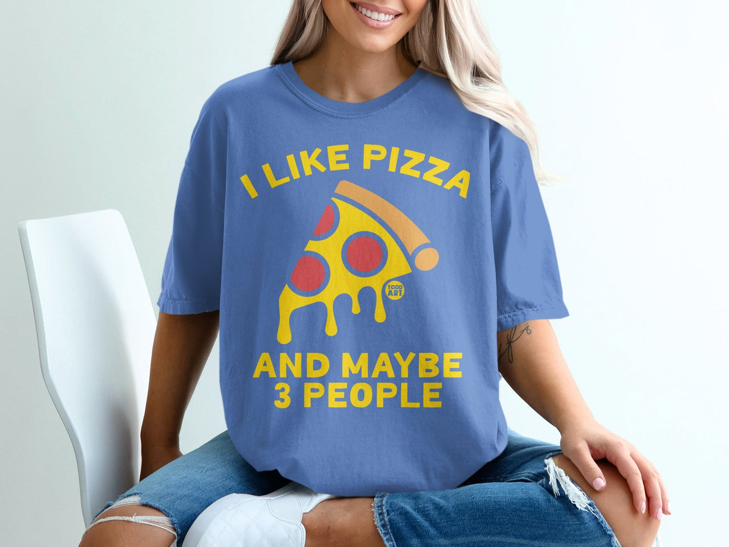 Blue t-shirt with "I like pizza and maybe 3 people" and pizza graphic.