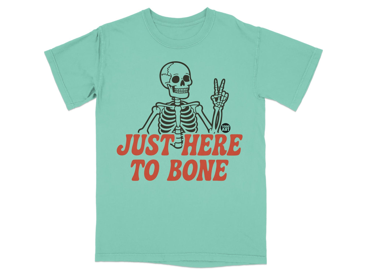Teal t-shirt with skeleton giving peace sign and text "JUST HERE TO BONE".
