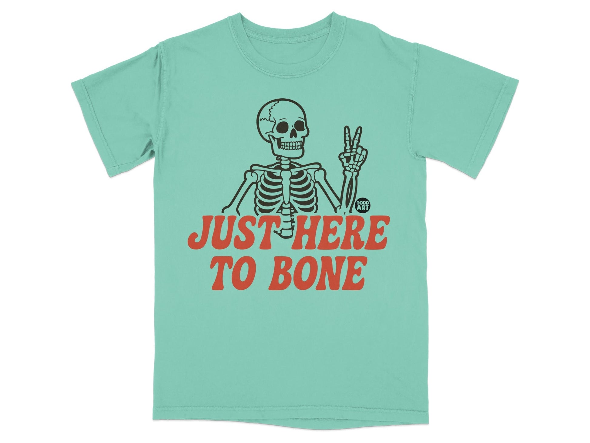 Teal t-shirt with skeleton giving peace sign and text "JUST HERE TO BONE".