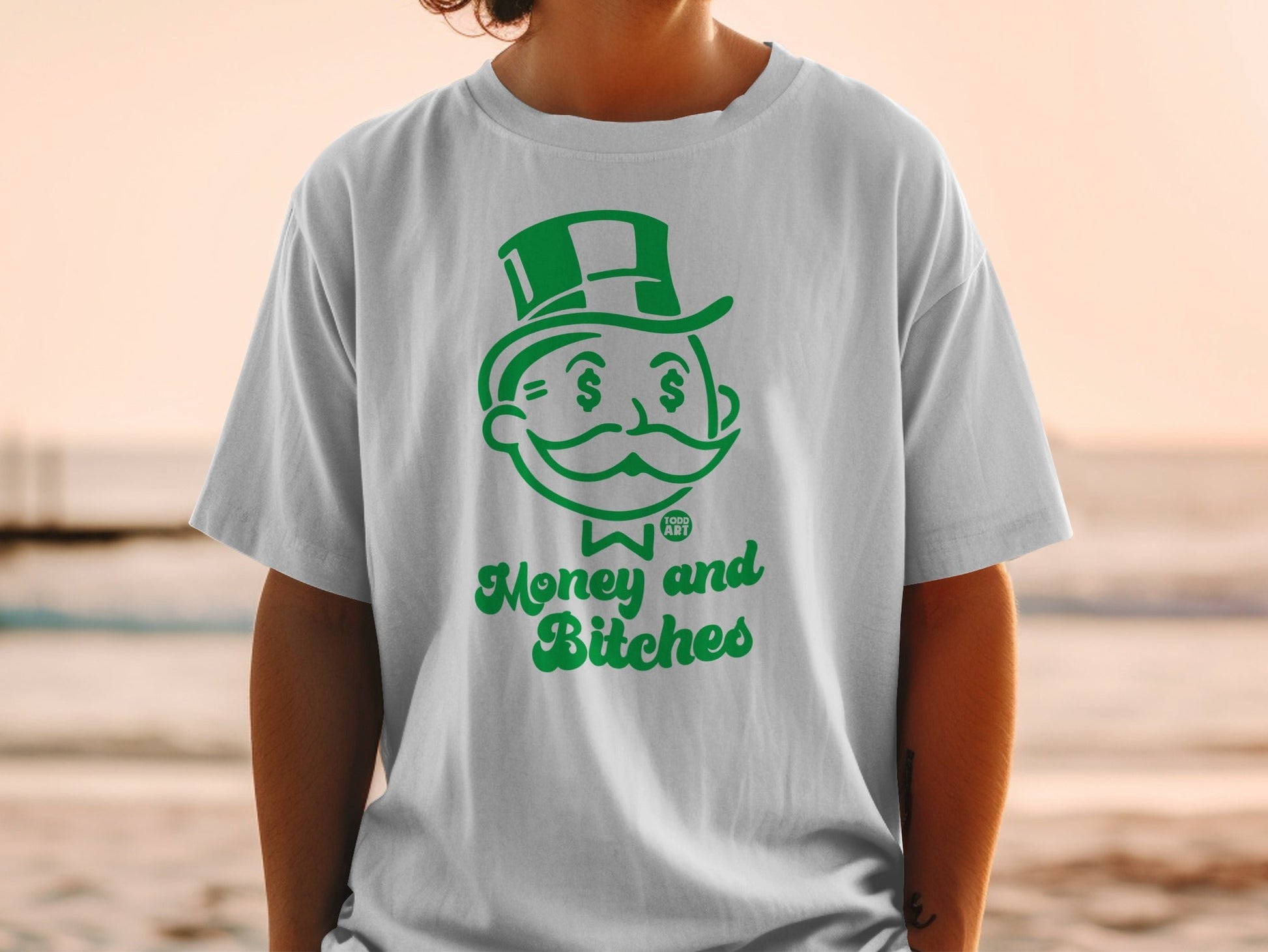 White t-shirt with "Money and Bitches" text and Monopoly Man graphic.