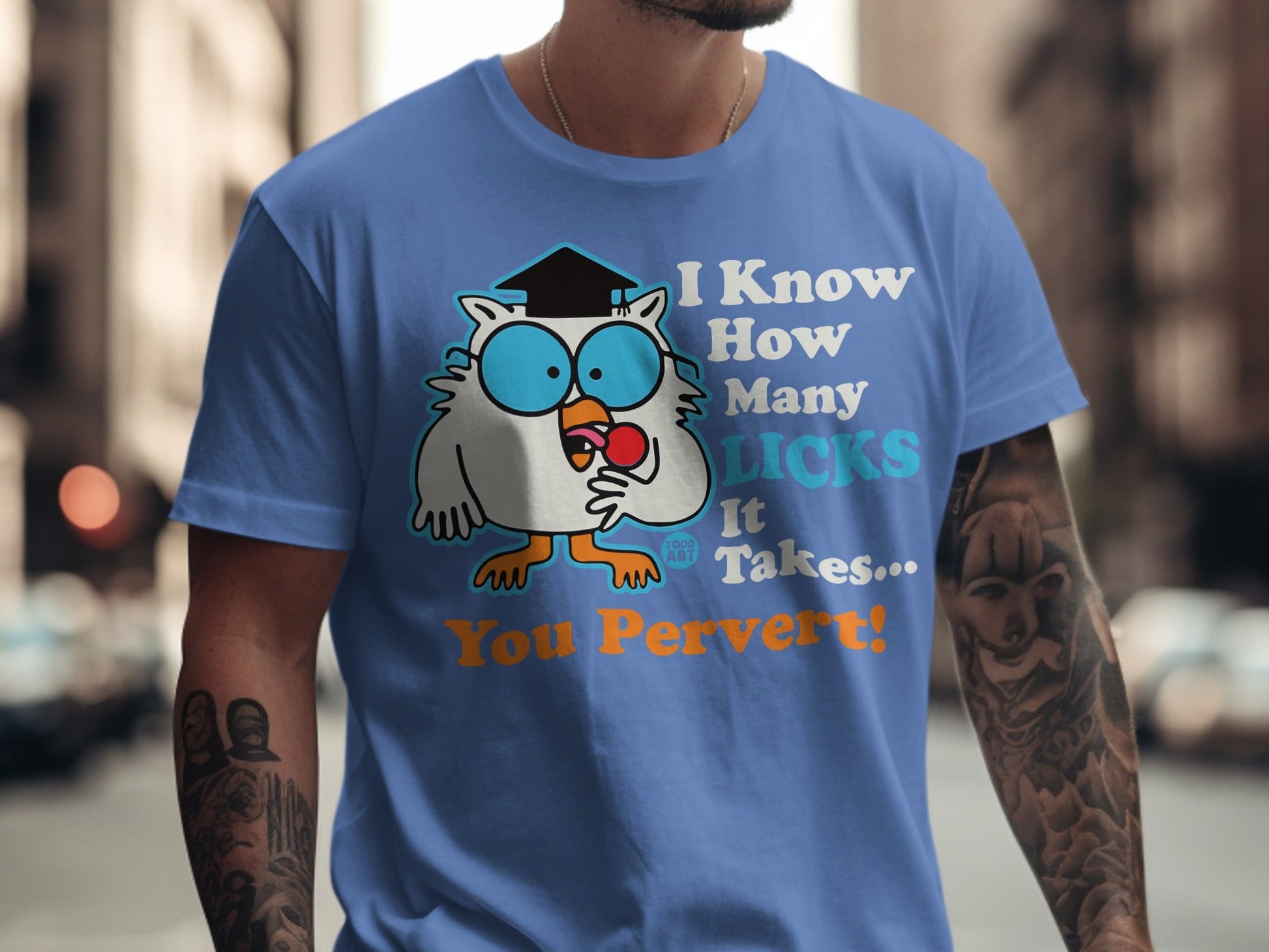 Blue t-shirt with cartoon owl wearing graduation cap, saying "I Know How Many Licks It Takes... You Pervert!"