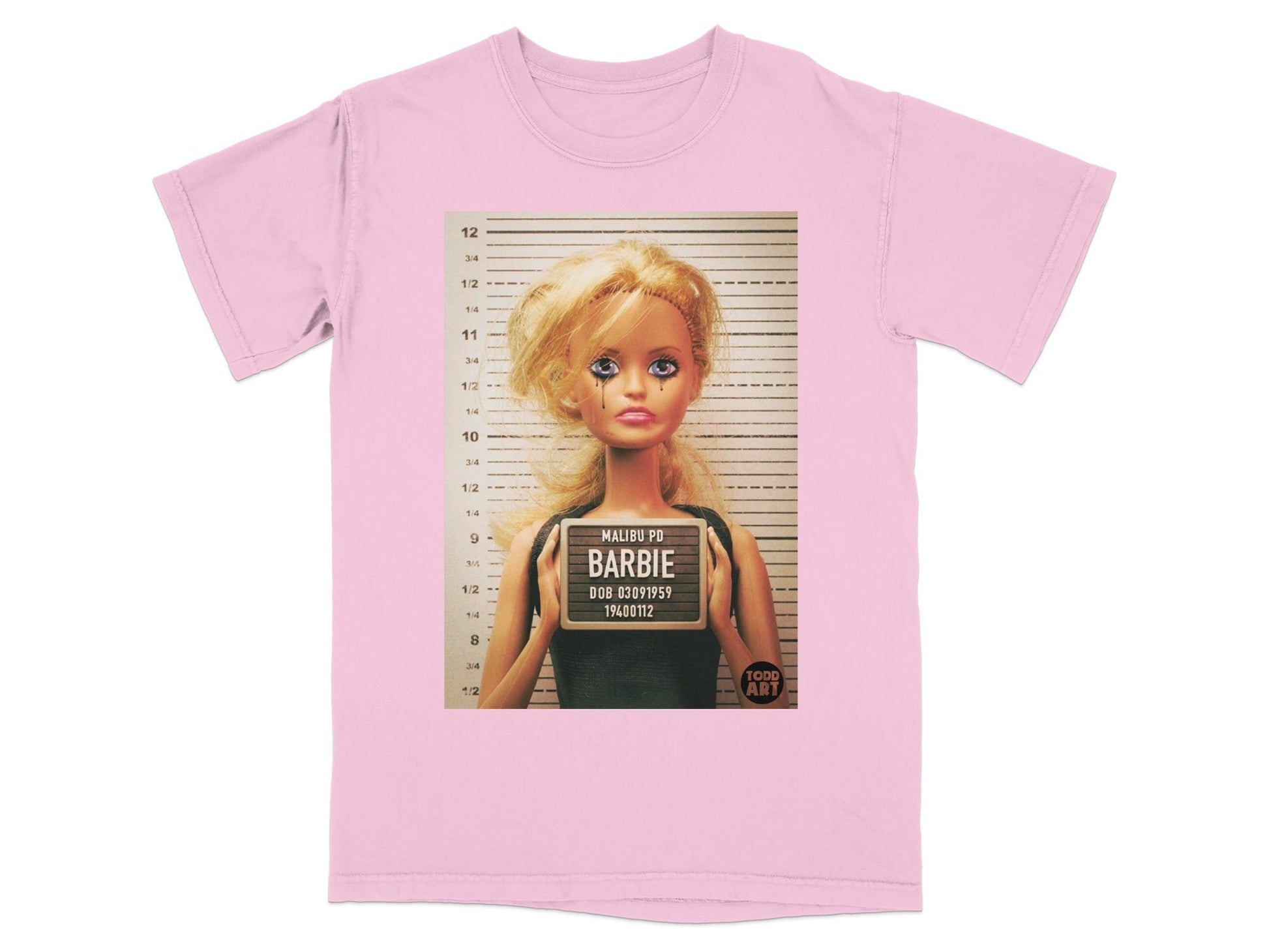 Pink t-shirt with Barbie mugshot and "Malibu PD Barbie" text.