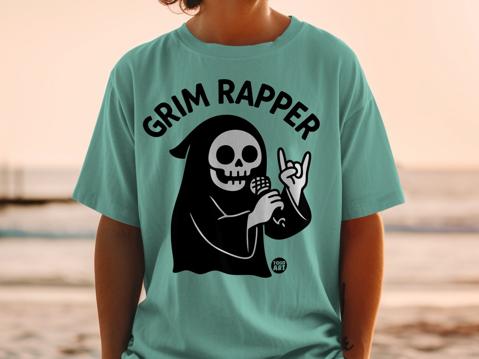Grim Reaper character wearing a t-shirt with "GRIM RAPPER" text.