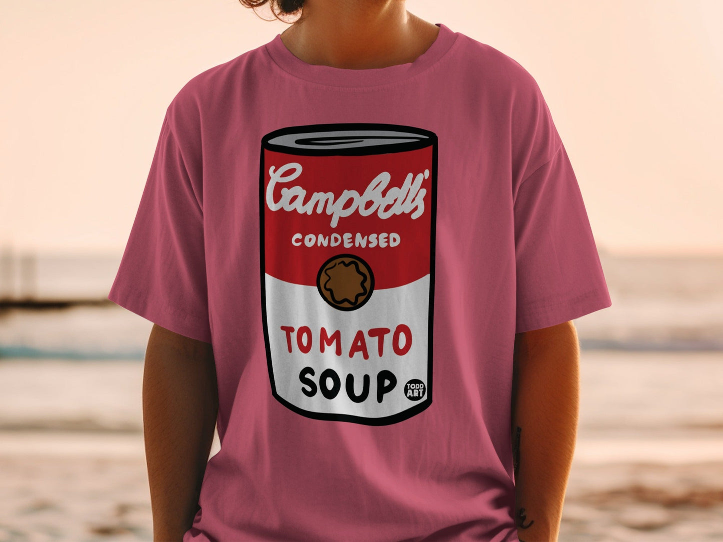 Pink t-shirt featuring Campbell's Condensed Tomato Soup can art.