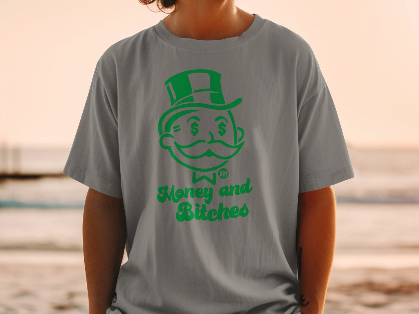 Grey t-shirt with a Monopoly man graphic and "Money and Bitches" text.