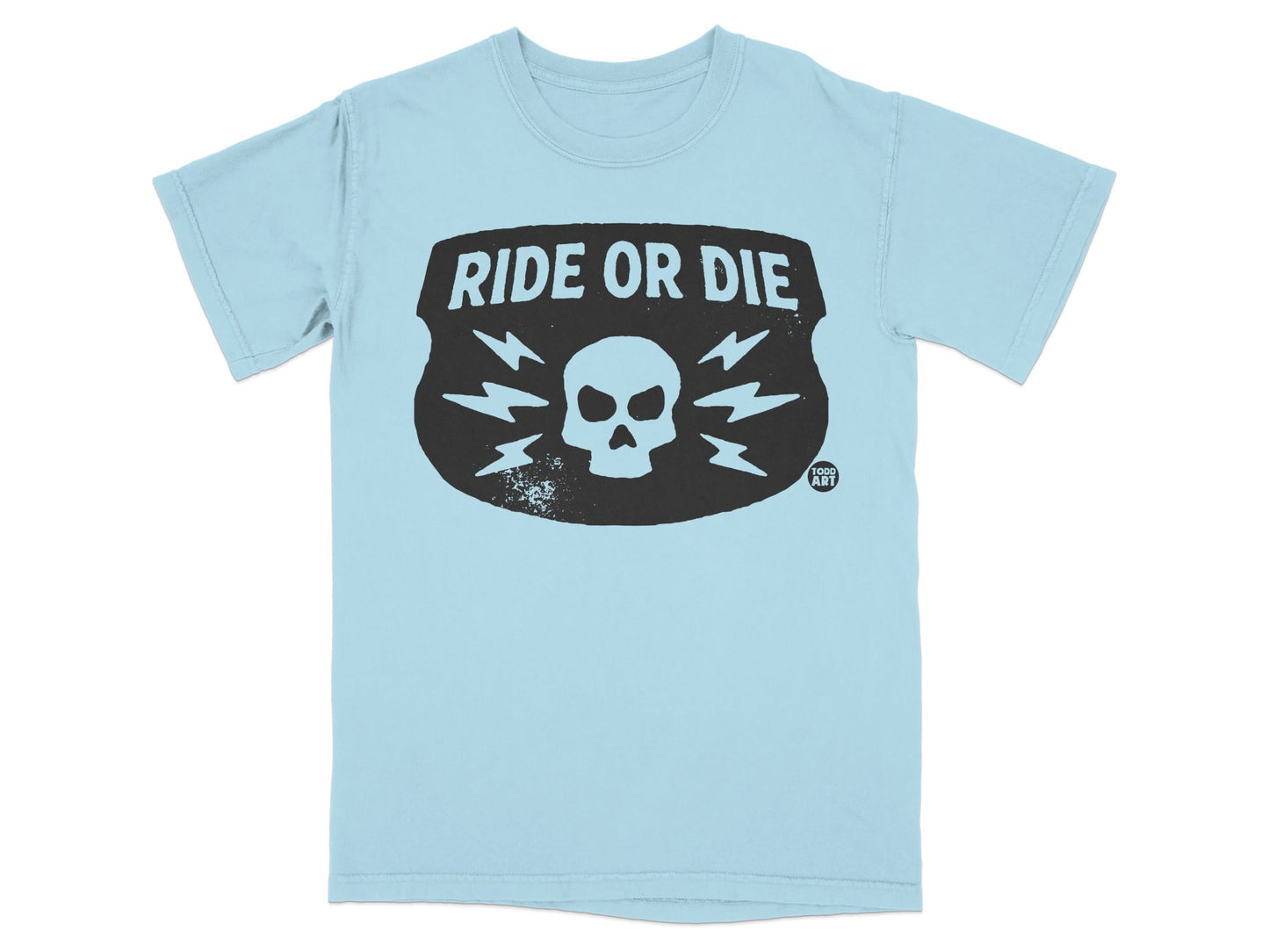 Light blue t-shirt with black shield logo featuring "RIDE OR DIE" and lightning bolts.
