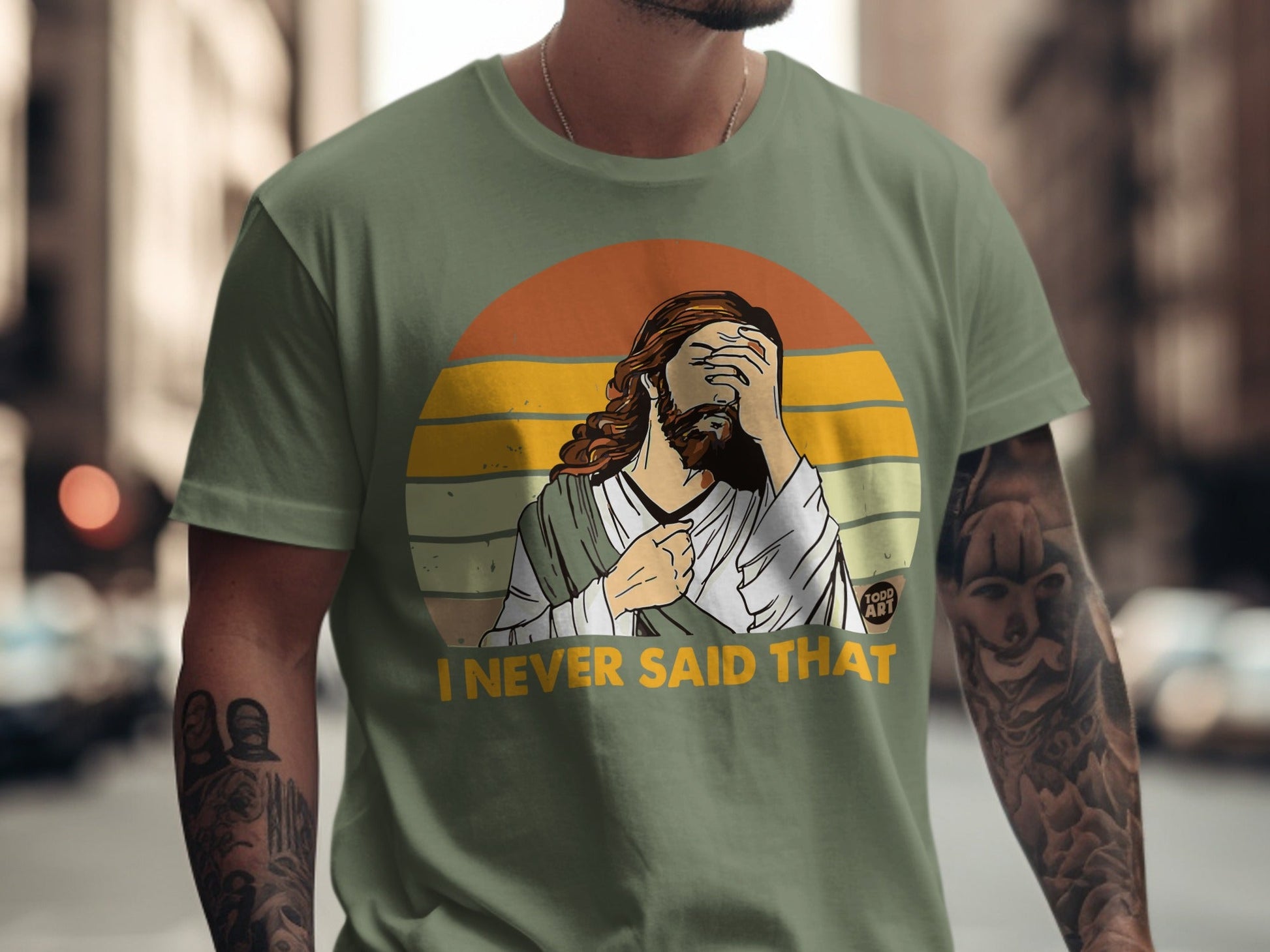 T-shirt with Jesus graphic and "I NEVER SAID THAT" text.