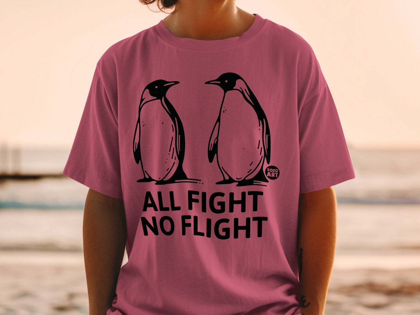 T-shirt with two penguins and text "ALL FIGHT NO FLIGHT"