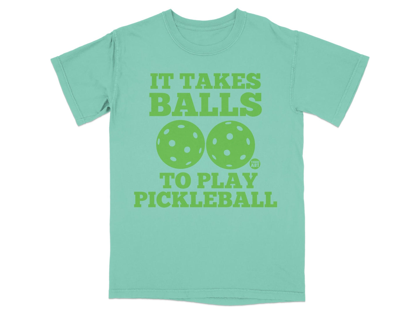 Mint green t-shirt with "IT TAKES BALLS TO PLAY PICKLEBALL" and pickleball graphics.