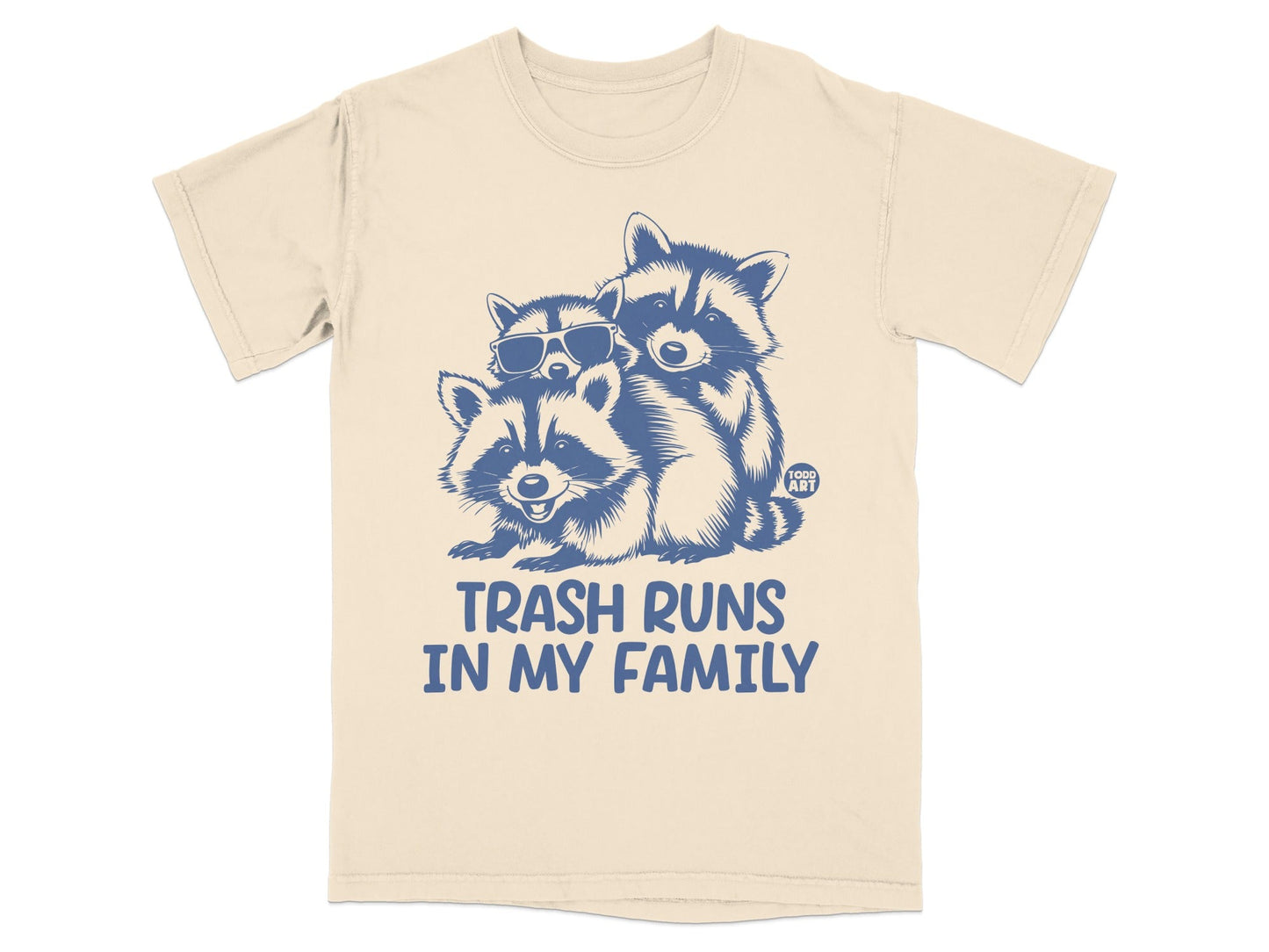 Three smiling raccoons wearing sunglasses with "TRASH RUNS IN MY FAMILY" text.
