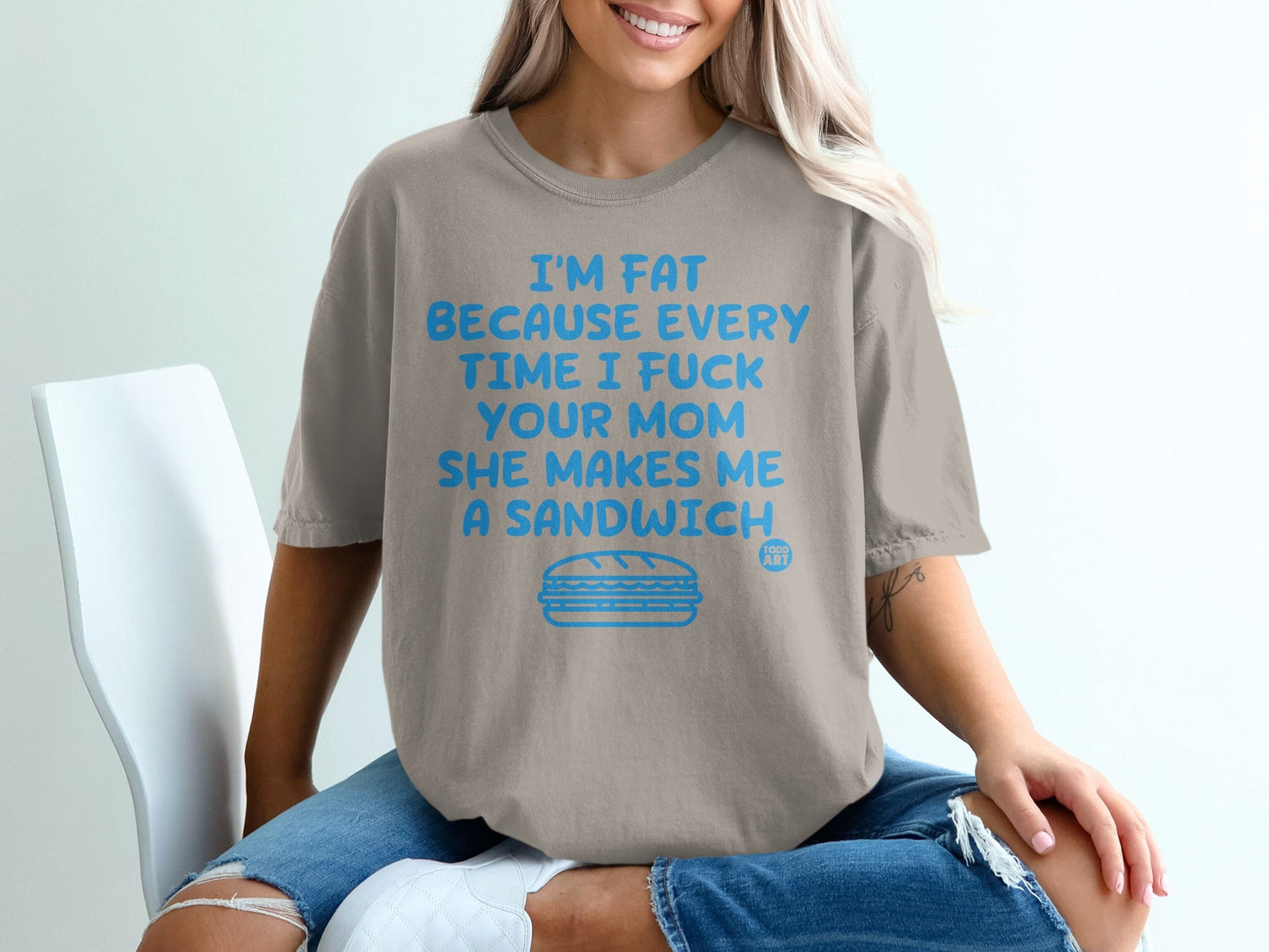 T-shirt with bold blue text and sandwich graphic.