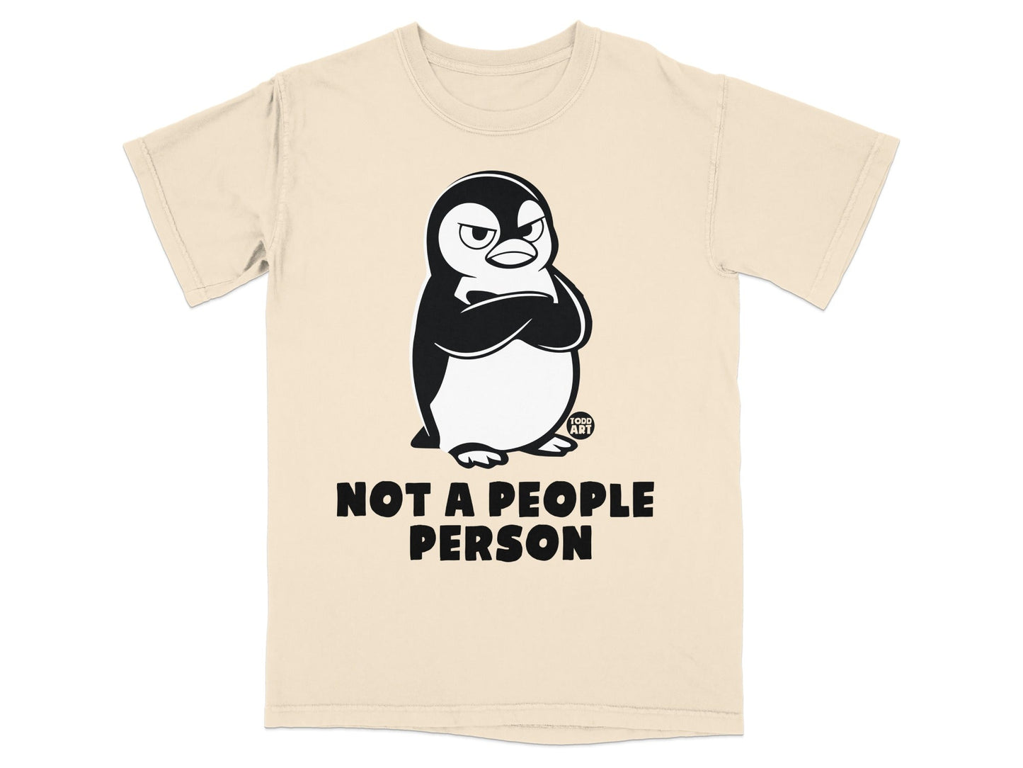 Cream t-shirt with a cartoon penguin and "Not a people person" text.