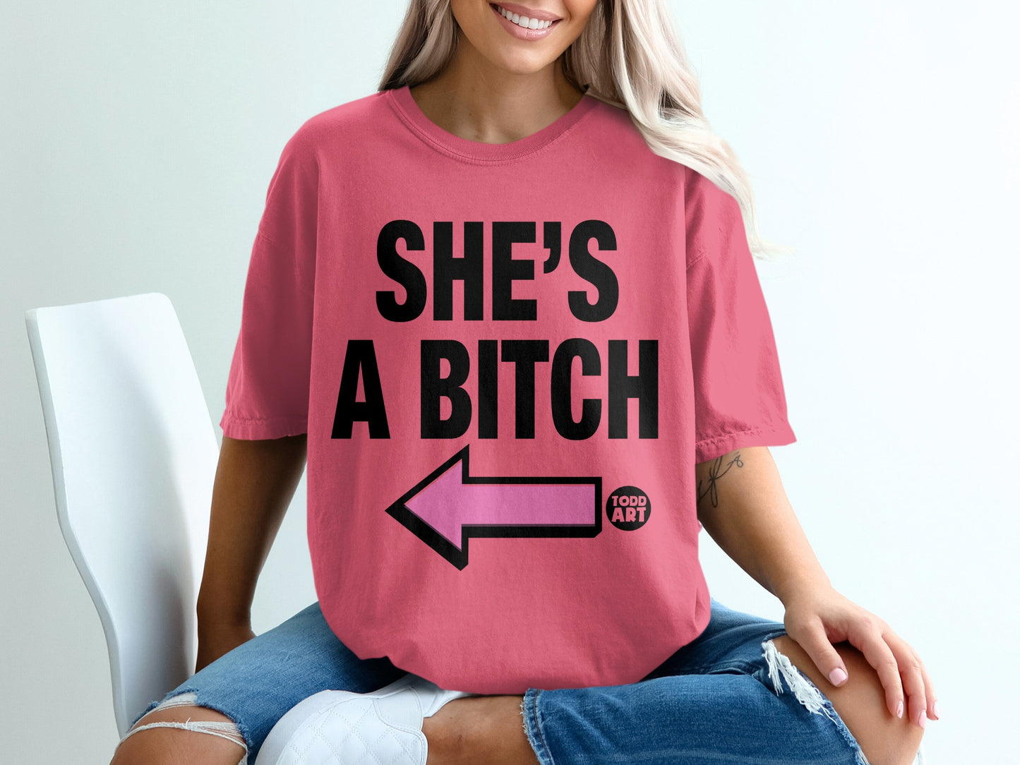 SHE'S A BITCH pink arrow TODD ART graphic t-shirt product type