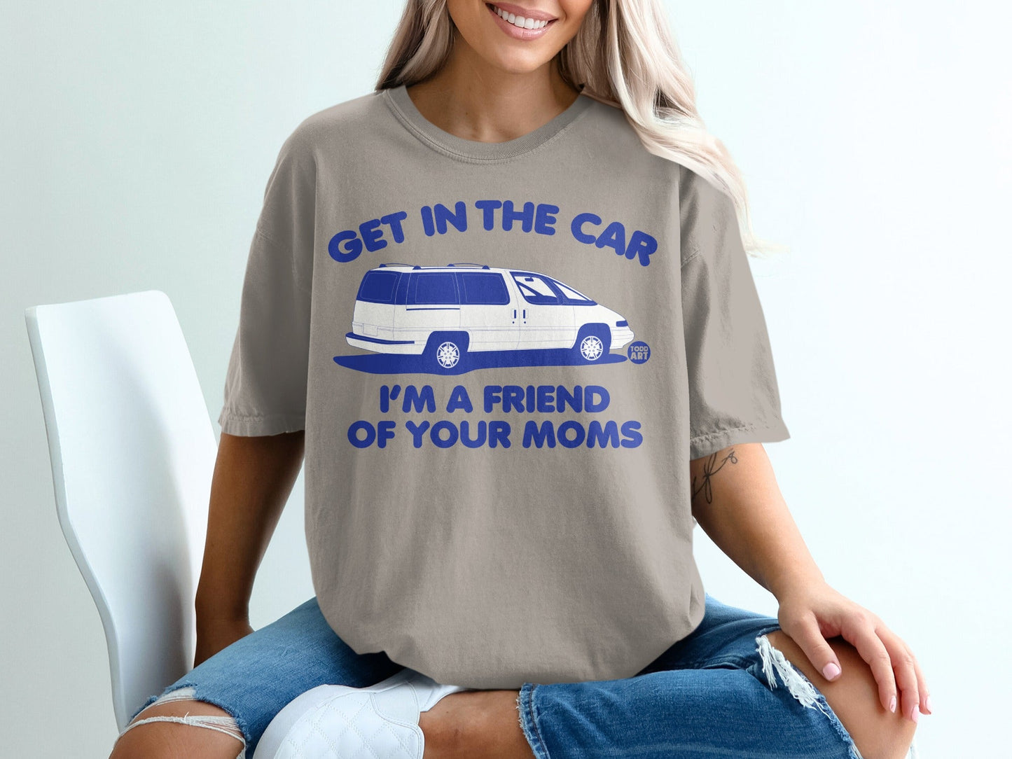 "Get in the car I'm a friend of your moms" graphic tee with van illustration.
