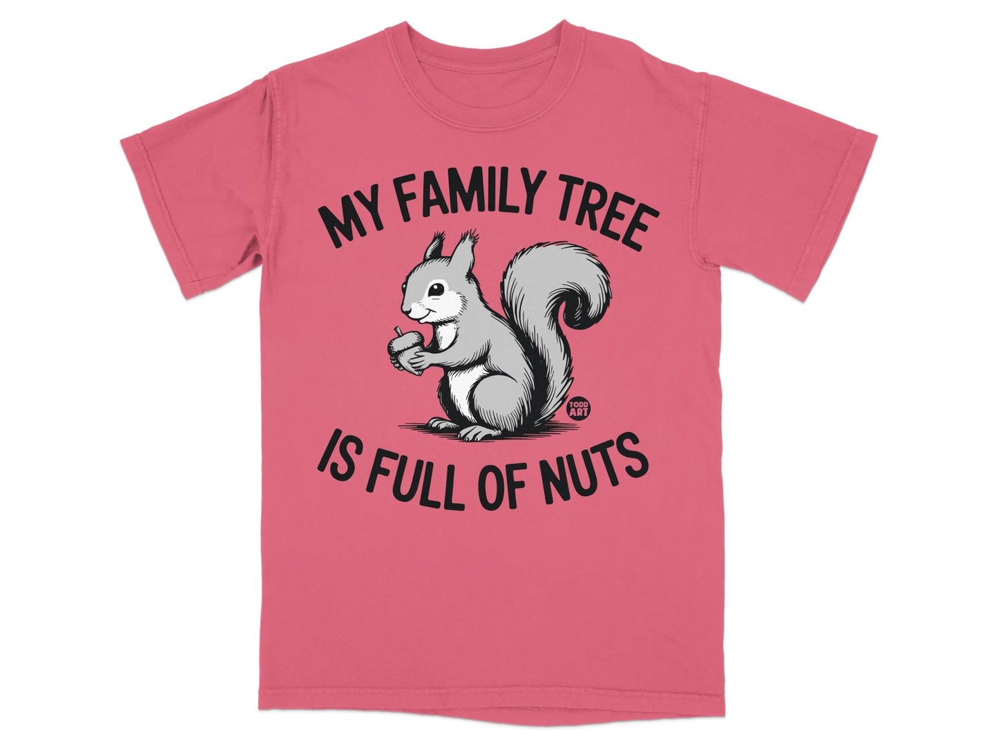 Pink t-shirt with a squirrel holding an acorn and text "MY FAMILY TREE IS FULL OF NUTS".