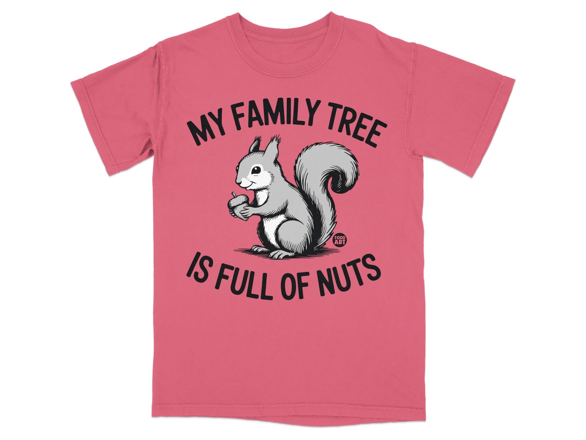 Pink t-shirt with a squirrel holding an acorn and text "MY FAMILY TREE IS FULL OF NUTS".